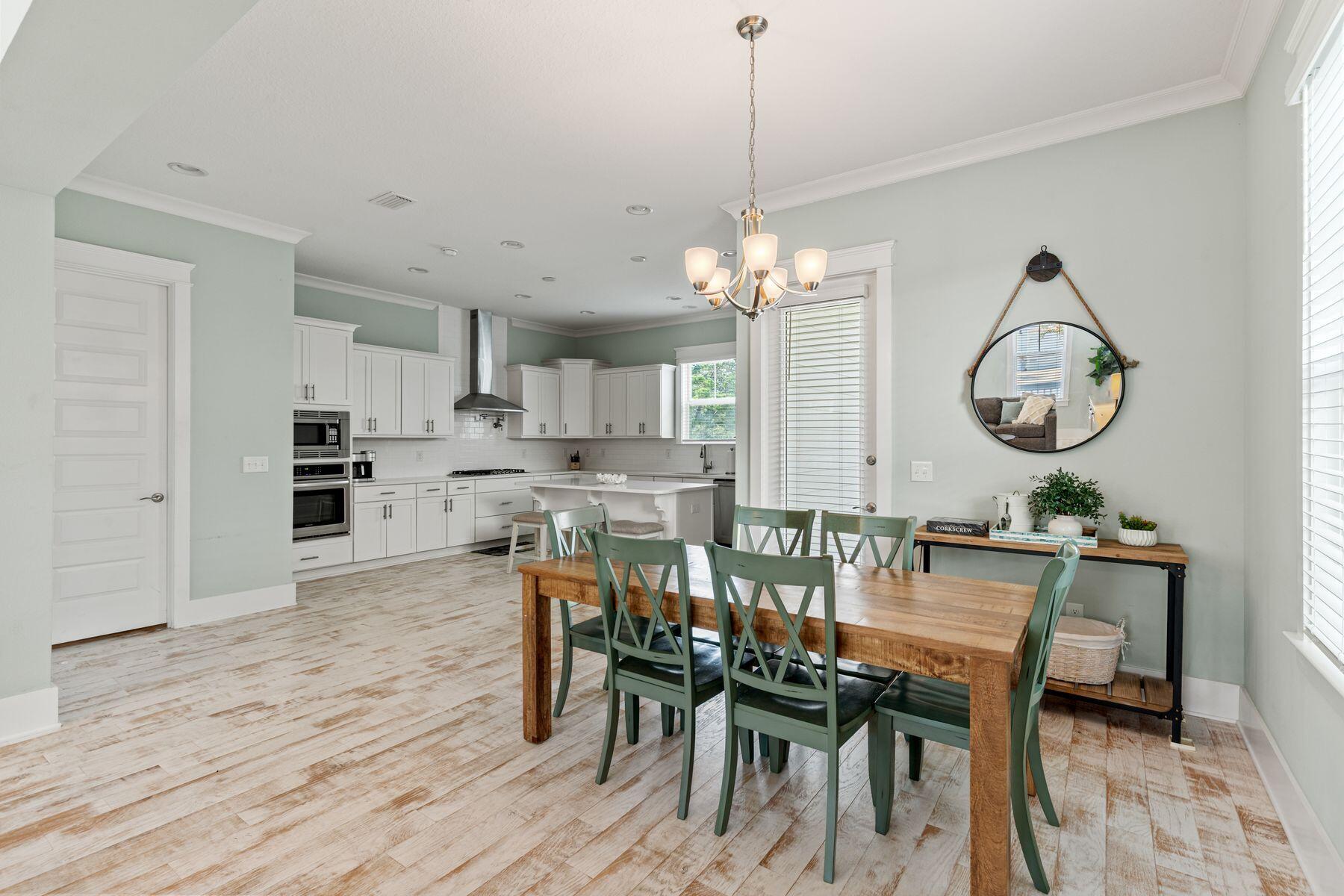 15 Cam Cove Inlet Beach Inlet Beach, FL 32461 - Photo 7 of 35 a view of a dining room with furniture a chandelier and wooden floor
