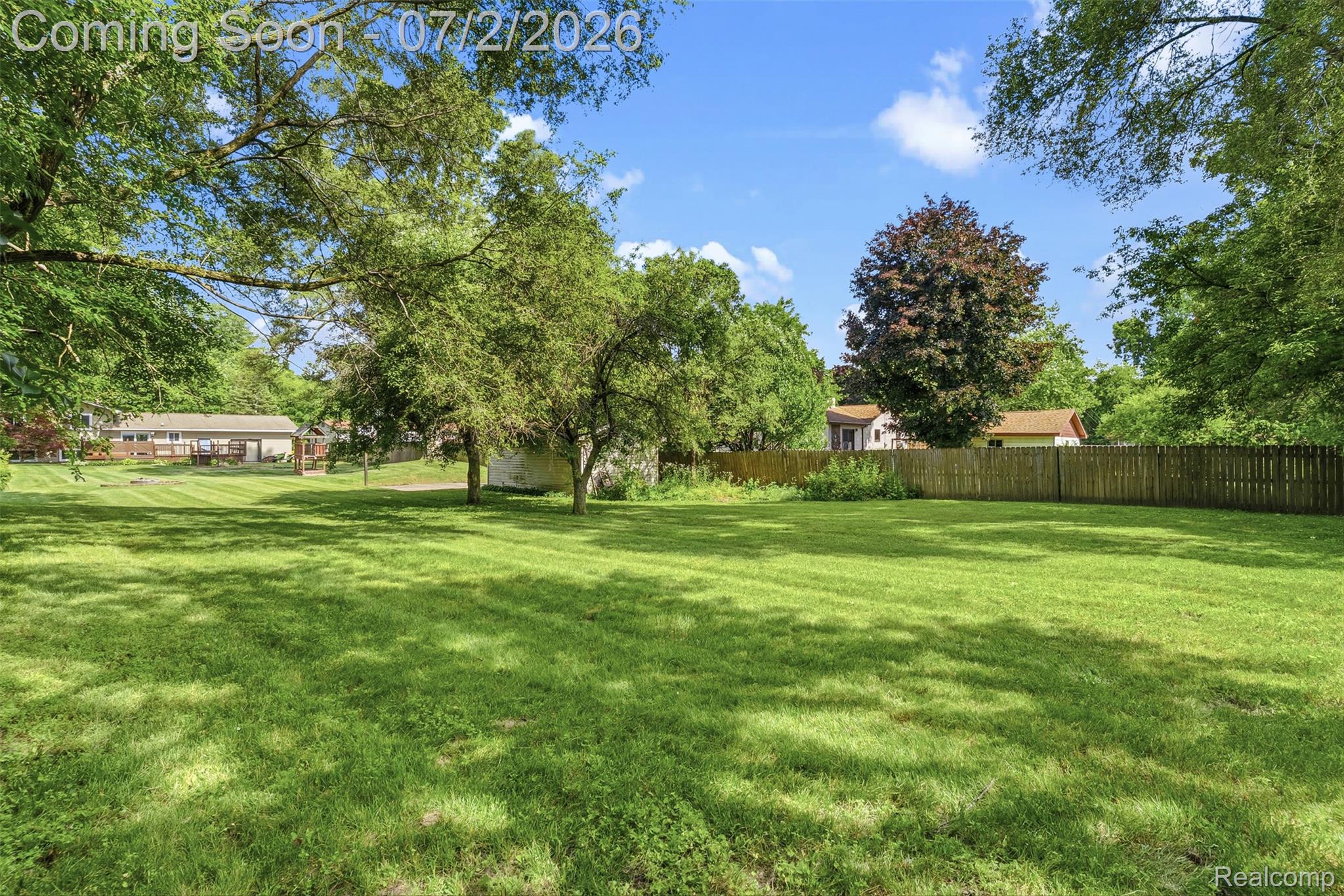 305 East Road Holly, MI 48442 - Photo 31 of 41 Expansive green lawn providing abundant outdoor space