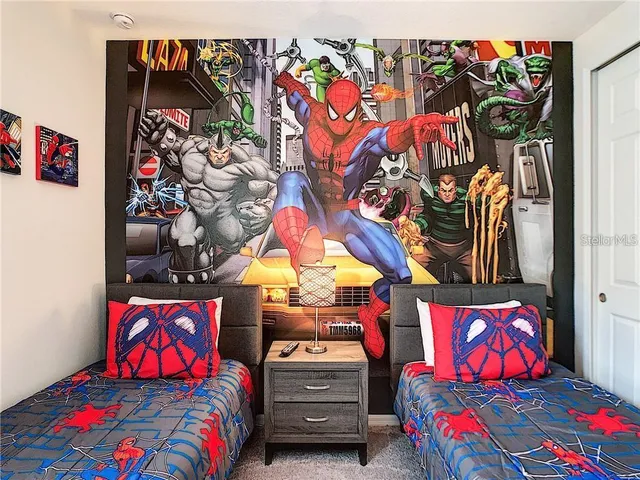 a bedroom with a bed and a couch