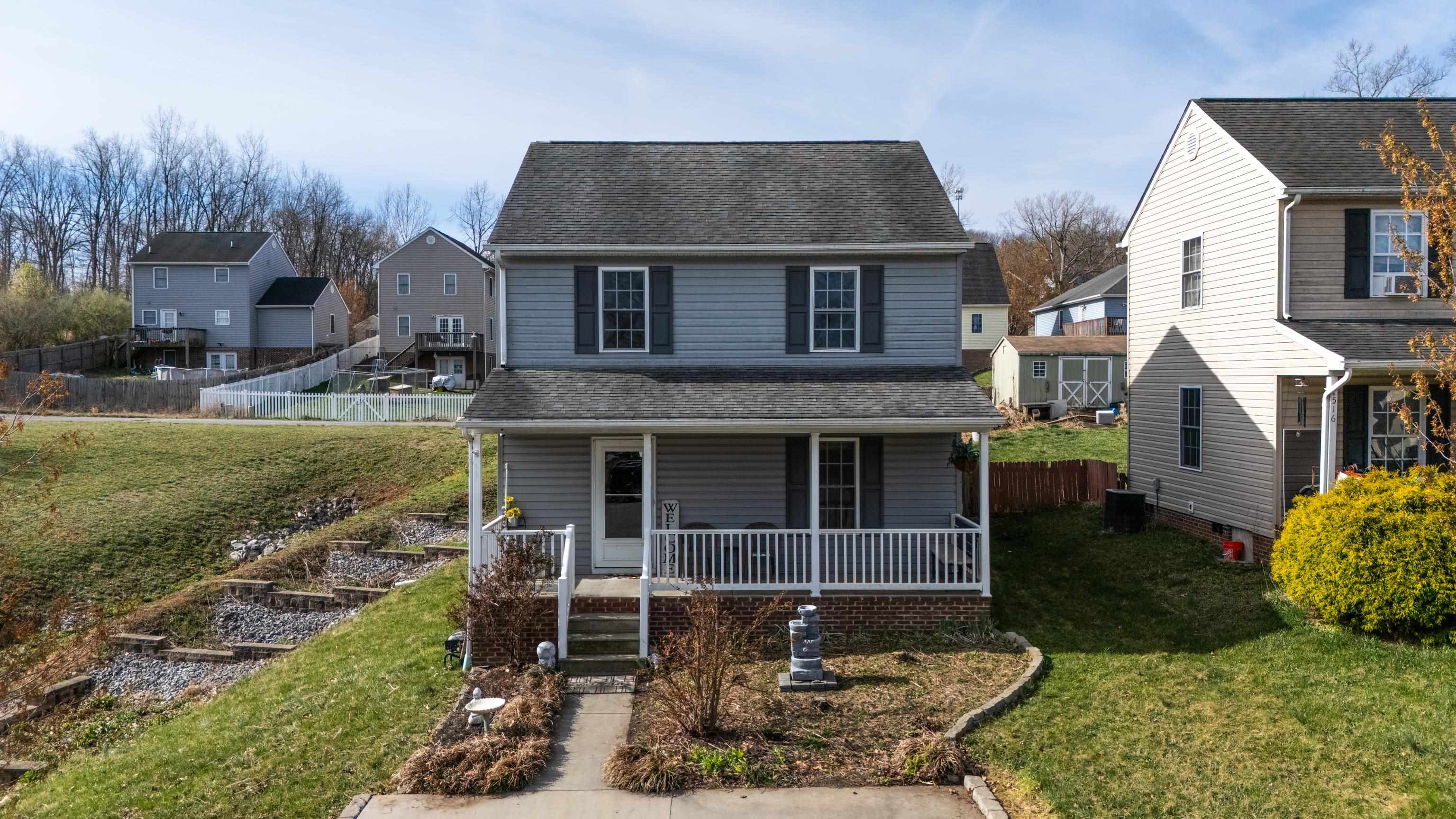 1520 3rd Street Waynesboro, VA 22980 - Photo 44 of 55 a front view of a house with garden