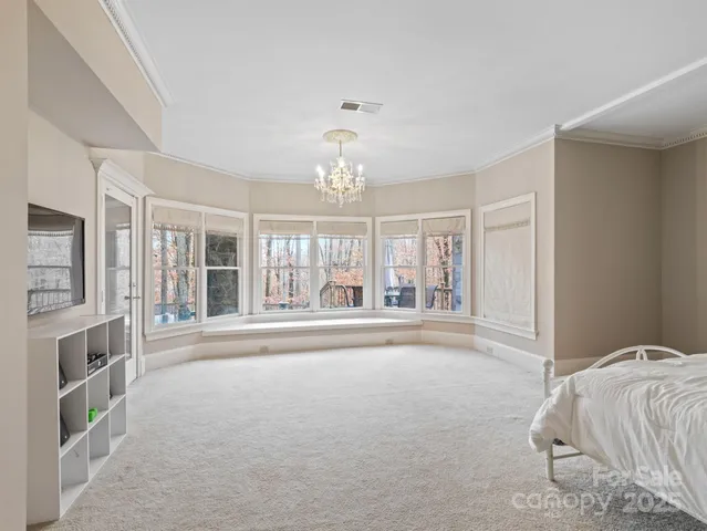 a bathroom with a sink vanity granite and a mirror