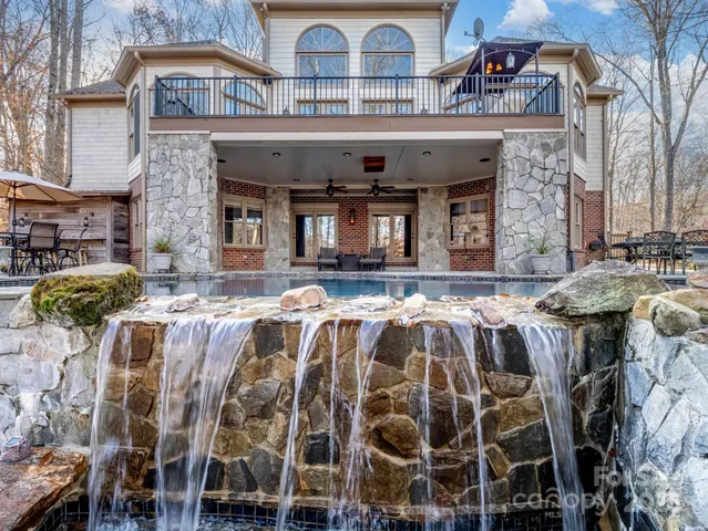 a view of a building with outdoor seating