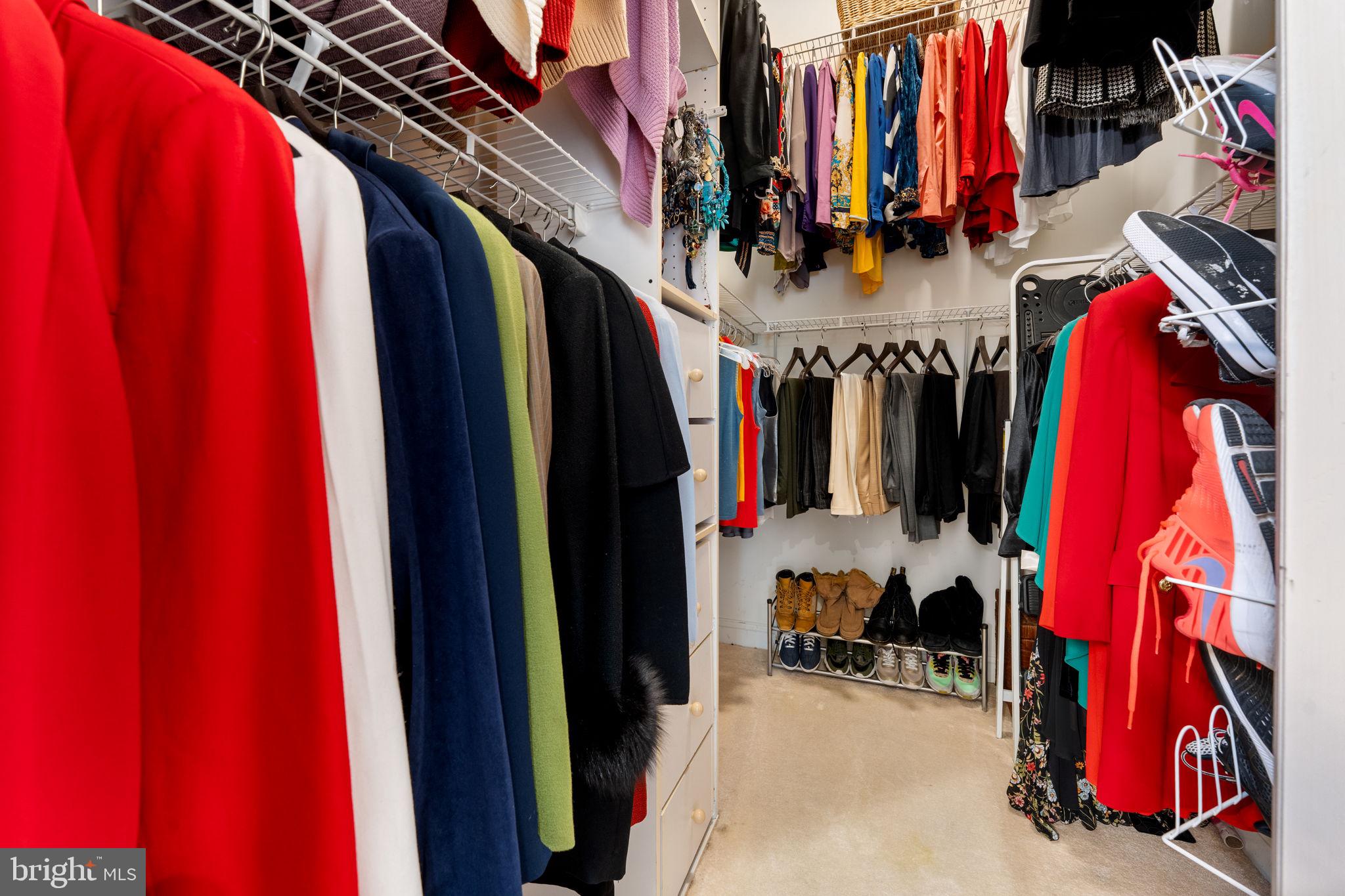 10613 Frank Tippett Road Cheltenham, MD 20623 - Photo 16 of 62 a view of walk in closet with clothes and shoes