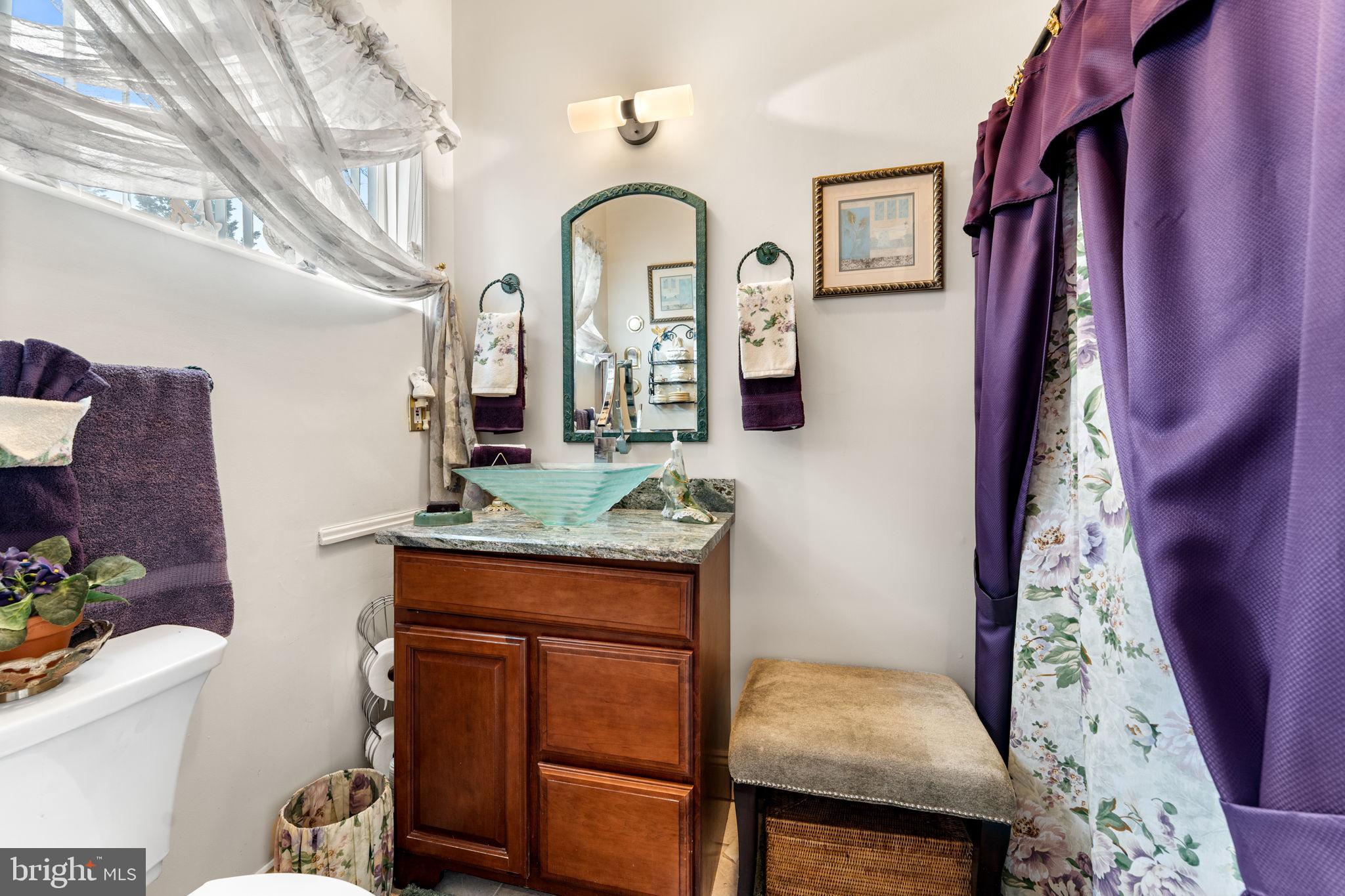 10613 Frank Tippett Road Cheltenham, MD 20623 - Photo 24 of 62 a view of balcony with furniture and wooden floor