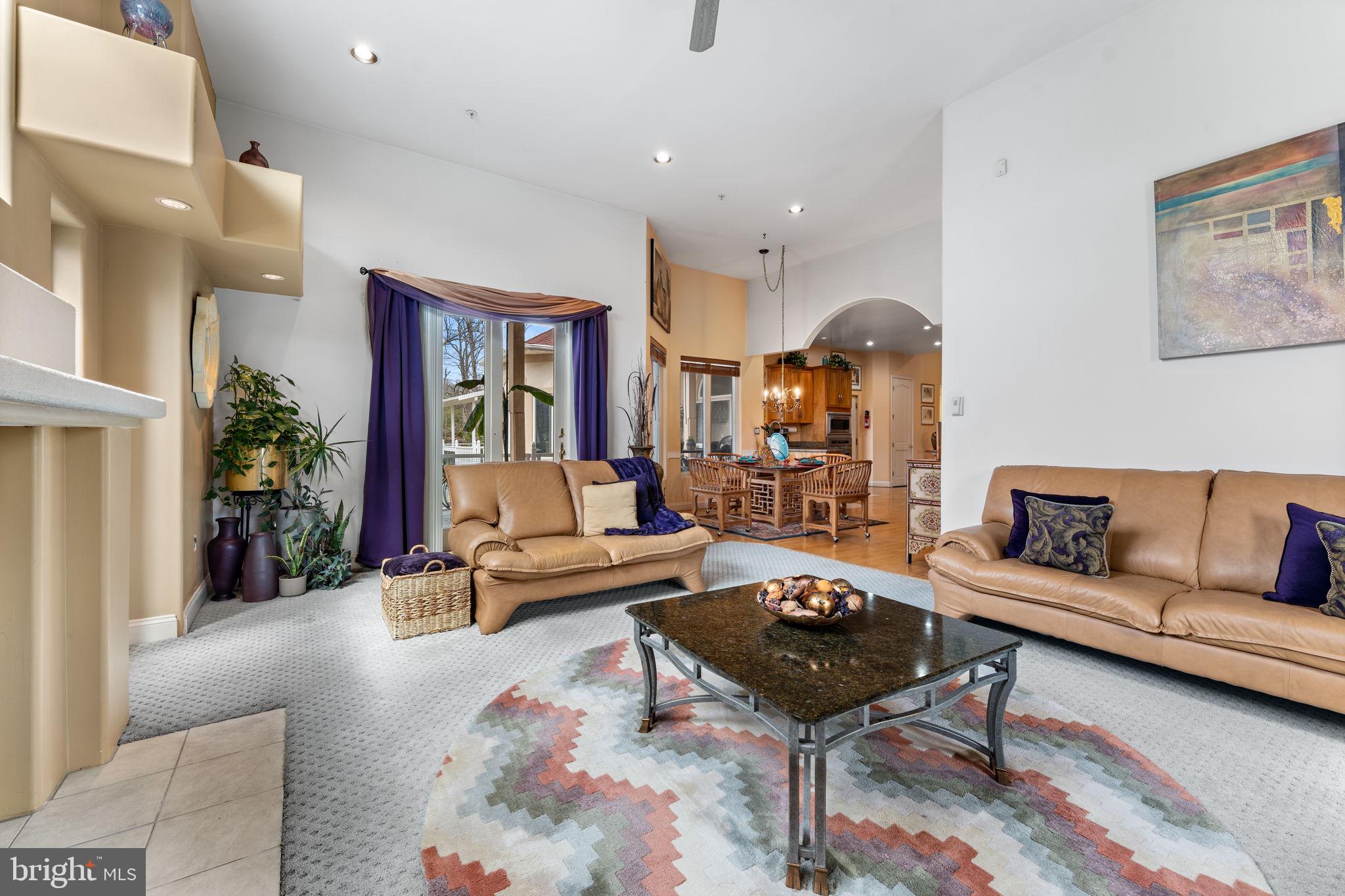 10613 Frank Tippett Road Cheltenham, MD 20623 - Photo 28 of 62 a living room with furniture and a potted plant