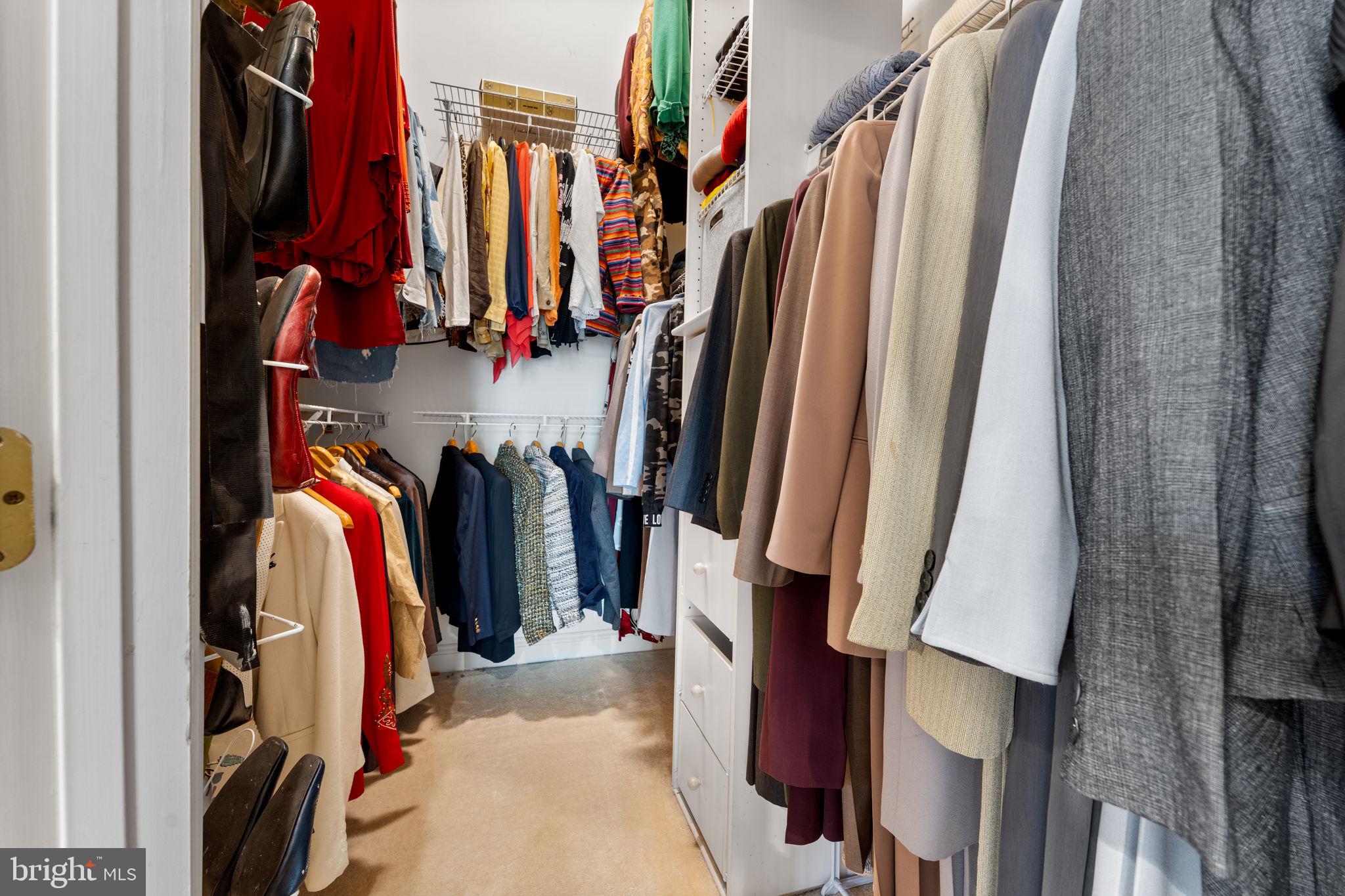 10613 Frank Tippett Road Cheltenham, MD 20623 - Photo 30 of 62 a view of walk in closet with clothes and shoes