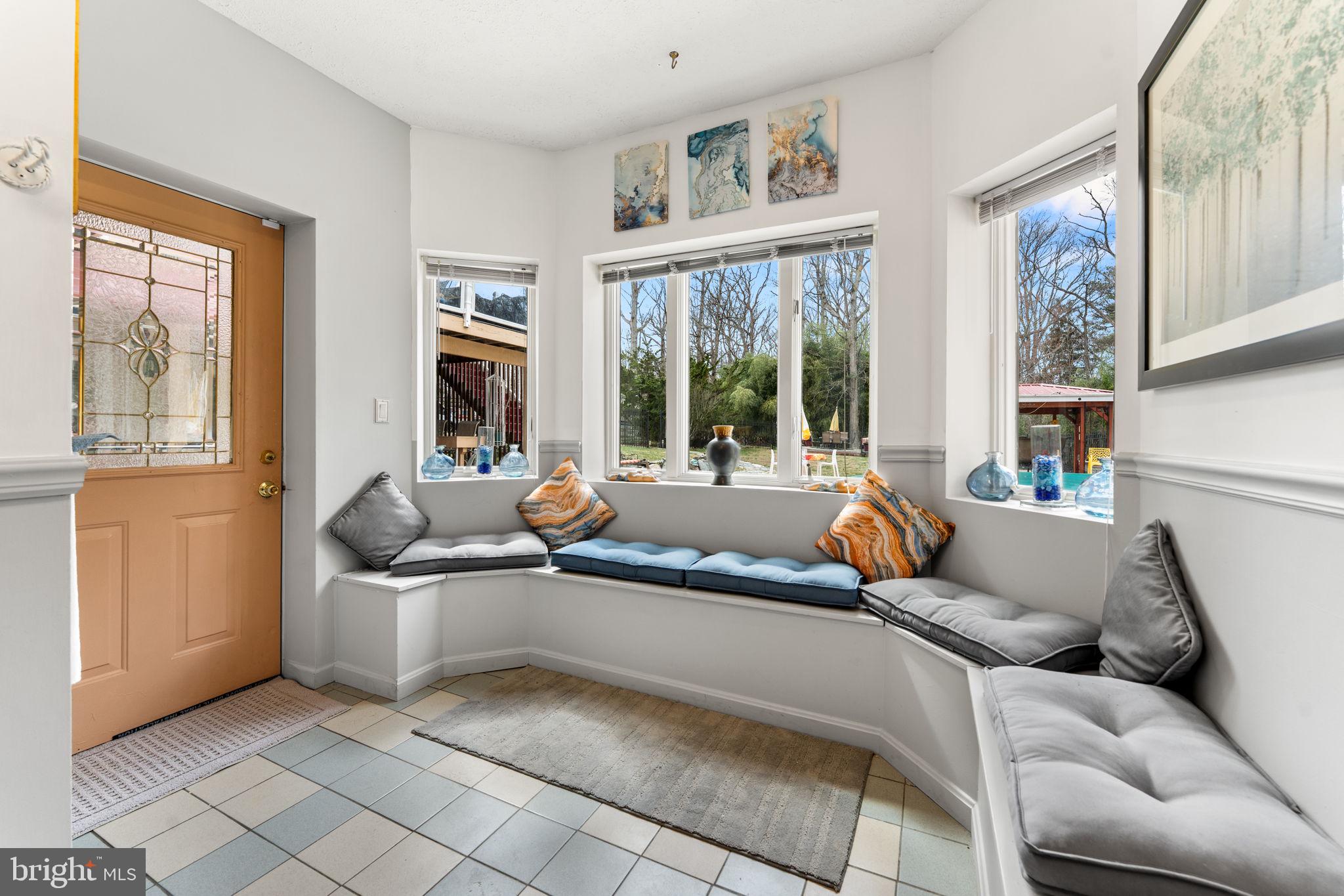 10613 Frank Tippett Road Cheltenham, MD 20623 - Photo 35 of 62 a living room with furniture and a large window