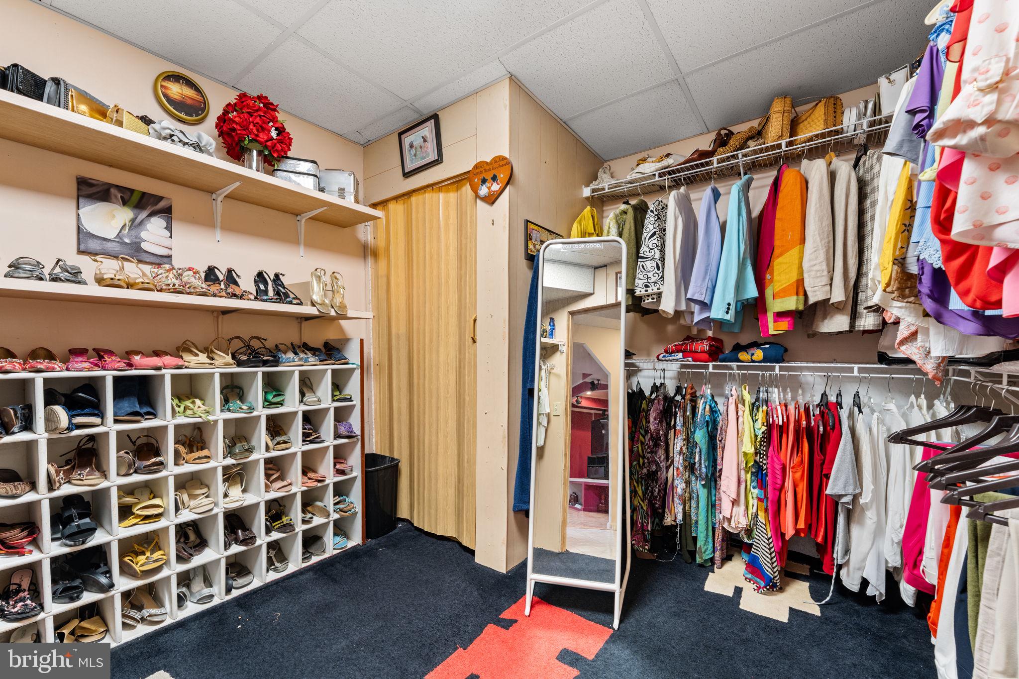 10613 Frank Tippett Road Cheltenham, MD 20623 - Photo 38 of 62 a view of walk in closet with clothes