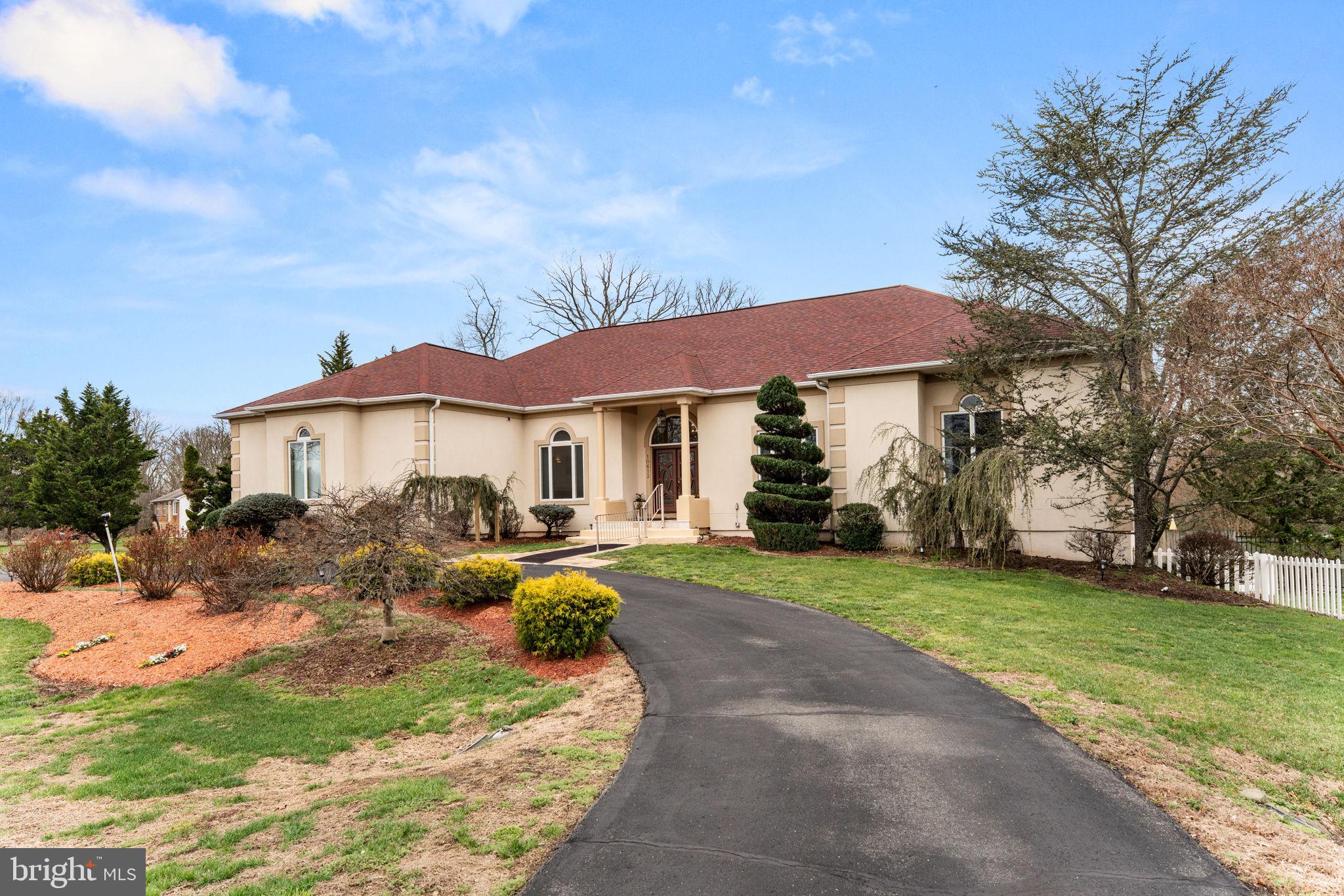10613 Frank Tippett Road Cheltenham, MD 20623 - Photo 57 of 62 a front view of a house with garden