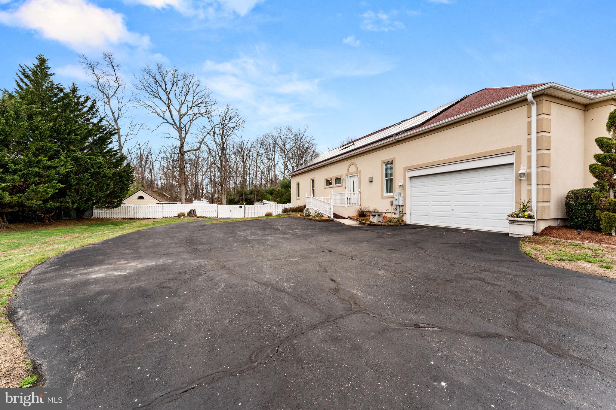 10613 Frank Tippett Road Cheltenham, MD 20623 - Photo 59 of 62 a view of a house with backyard and trees