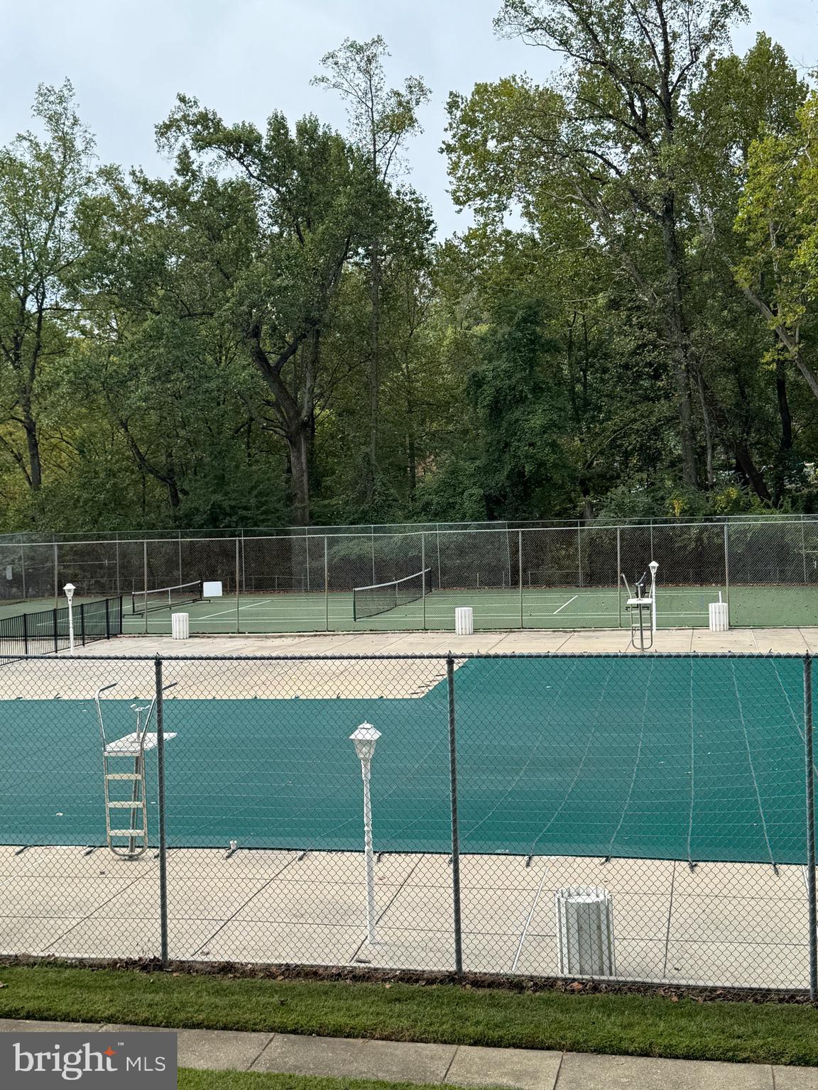 10524 Weymouth Street, Unit W1 Bethesda, MD 20814 - Photo 18 of 18 a view of yard with swimming pool and seating