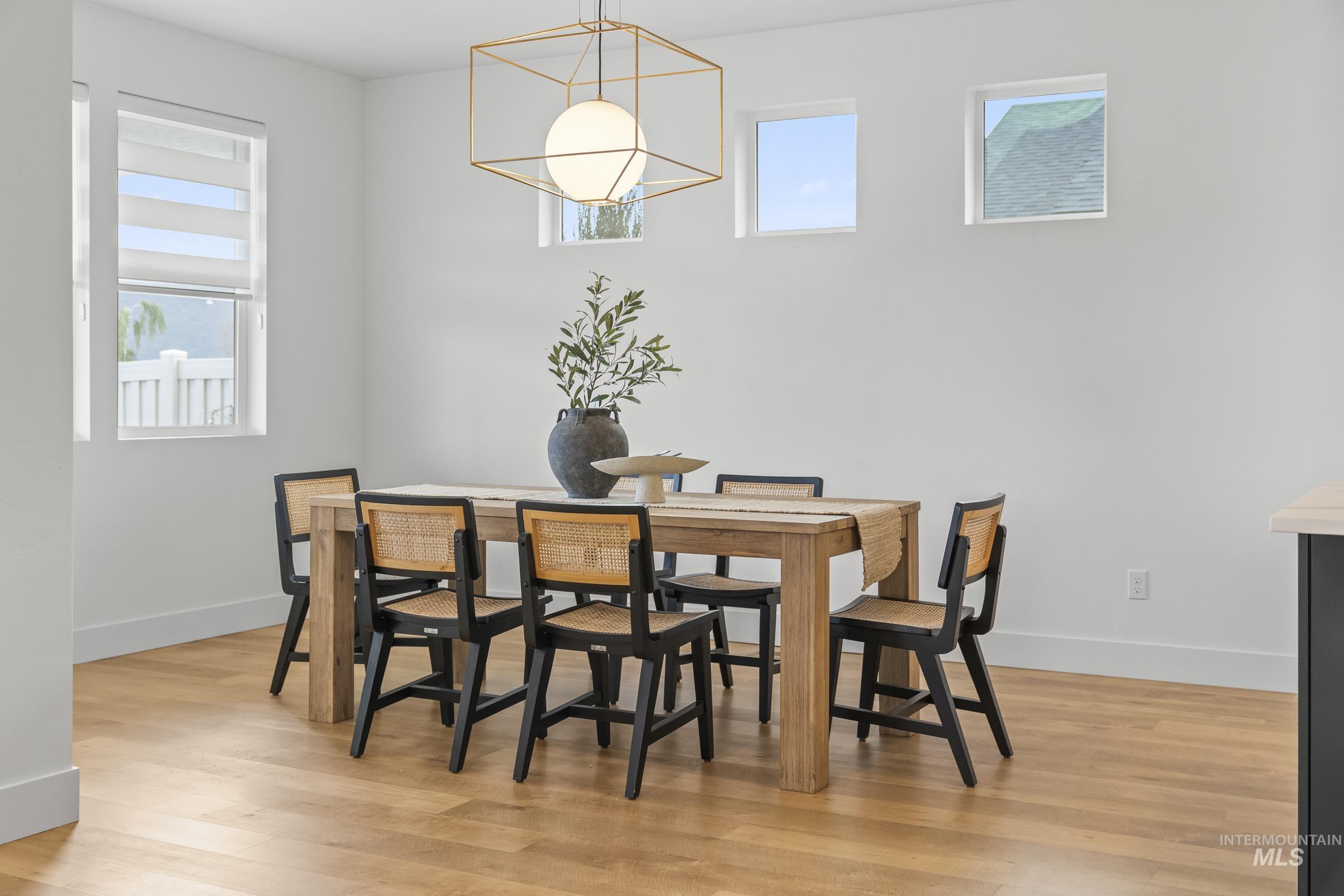 4320 South Selatir Way Meridian, ID 83642 - Photo 19 of 44 Dining space with light wood-type flooring and plenty of natural light