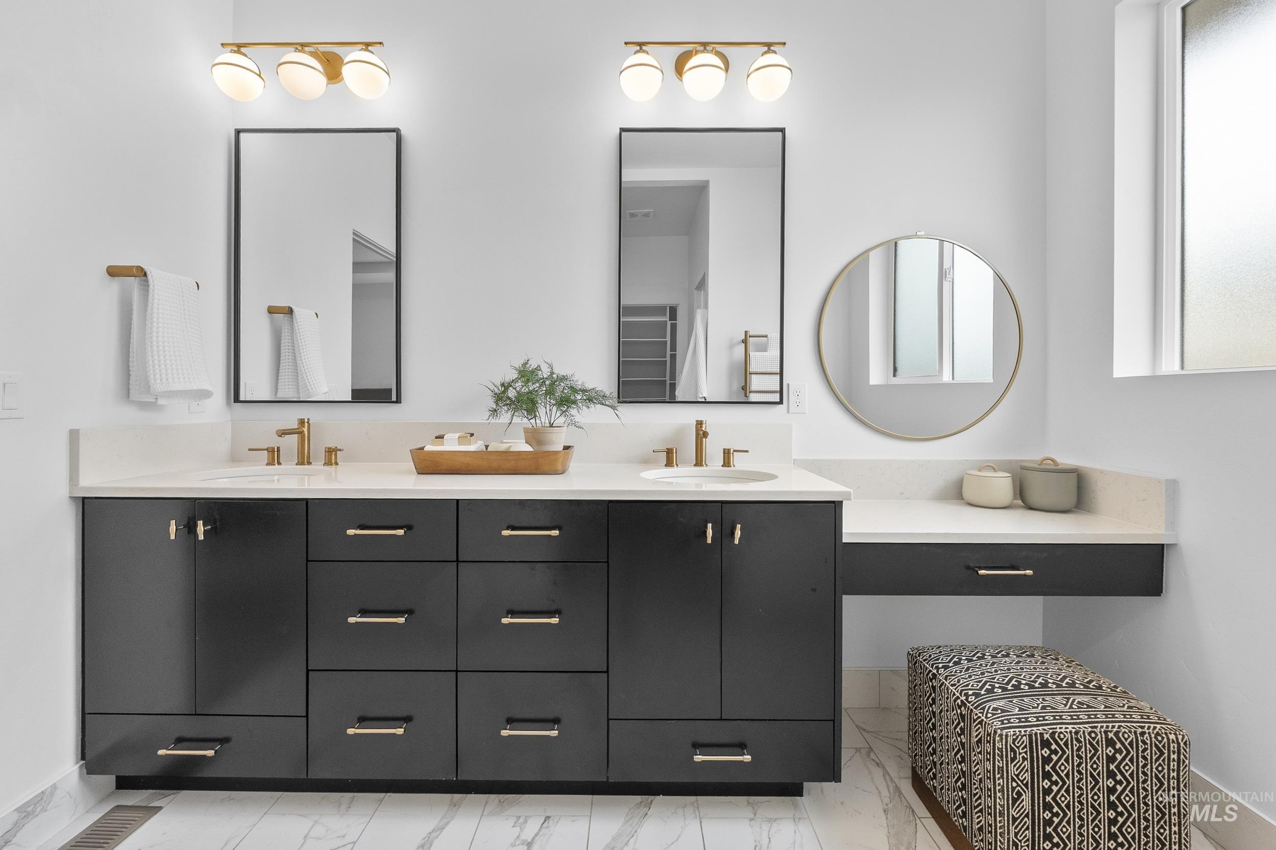 4320 South Selatir Way Meridian, ID 83642 - Photo 24 of 44 Full bathroom featuring double vanity and baseboards
