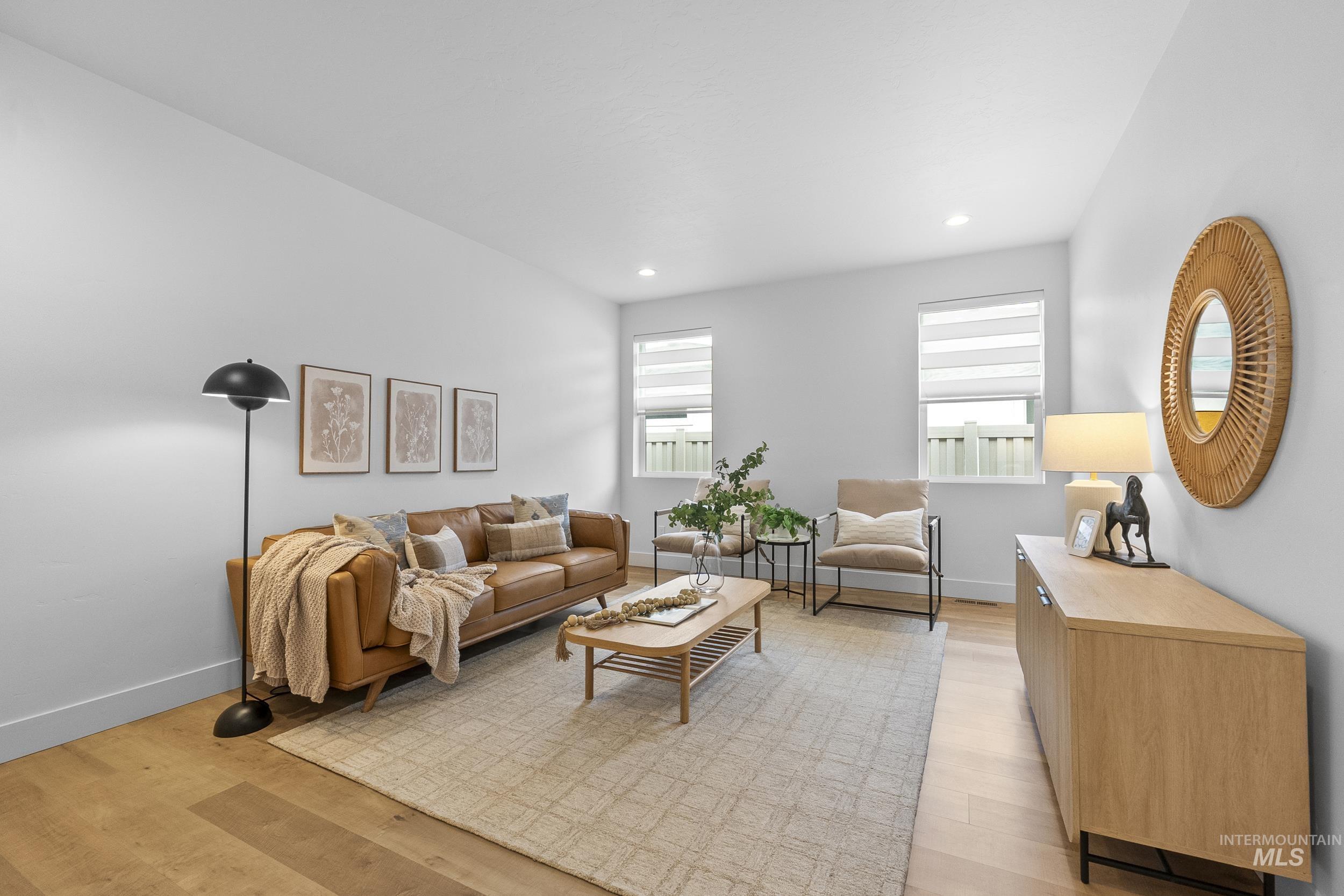 4320 South Selatir Way Meridian, ID 83642 - Photo 28 of 44 Living room with light wood-type flooring and recessed lighting