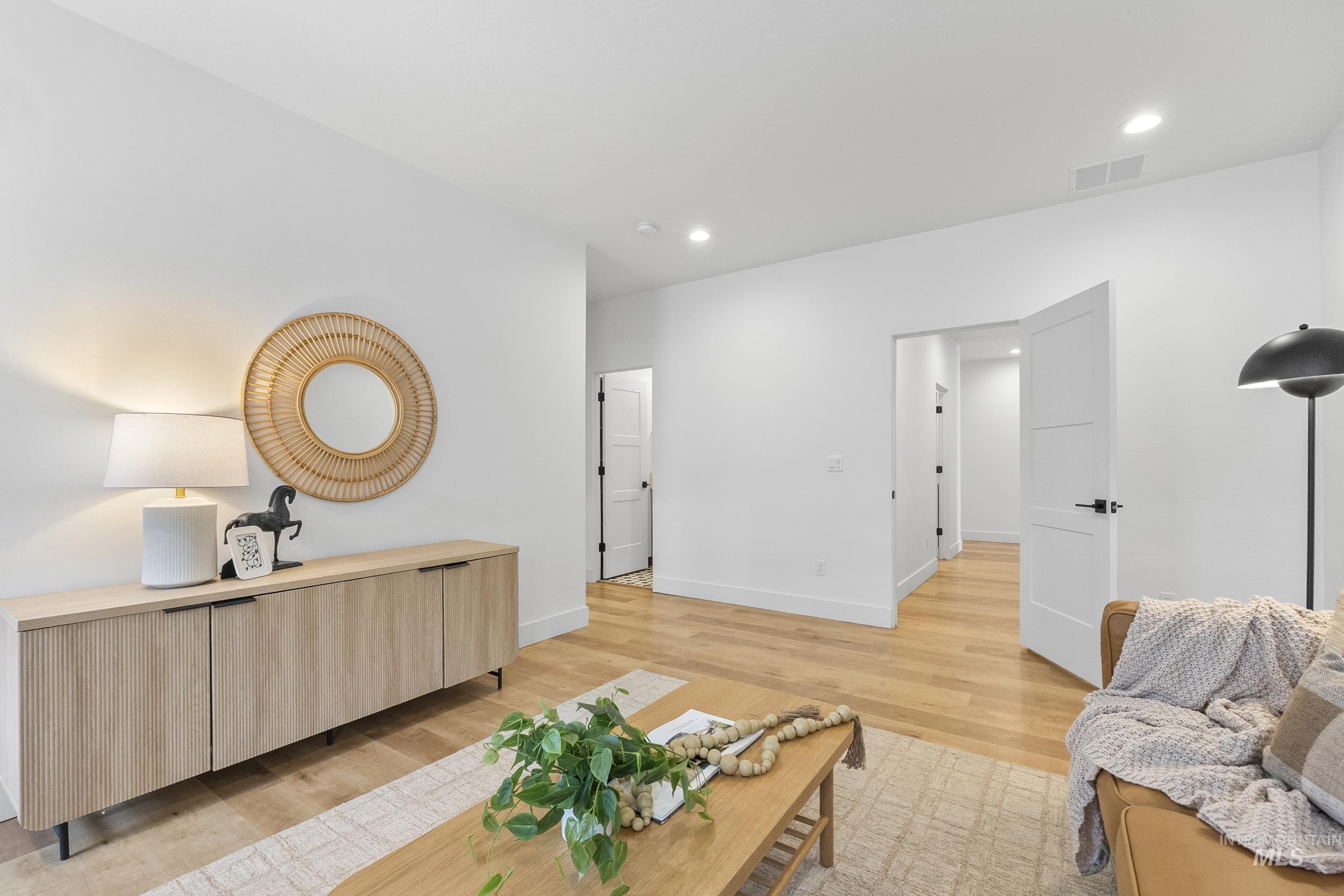 4320 South Selatir Way Meridian, ID 83642 - Photo 29 of 44 Living room with light wood-style floors and recessed lighting