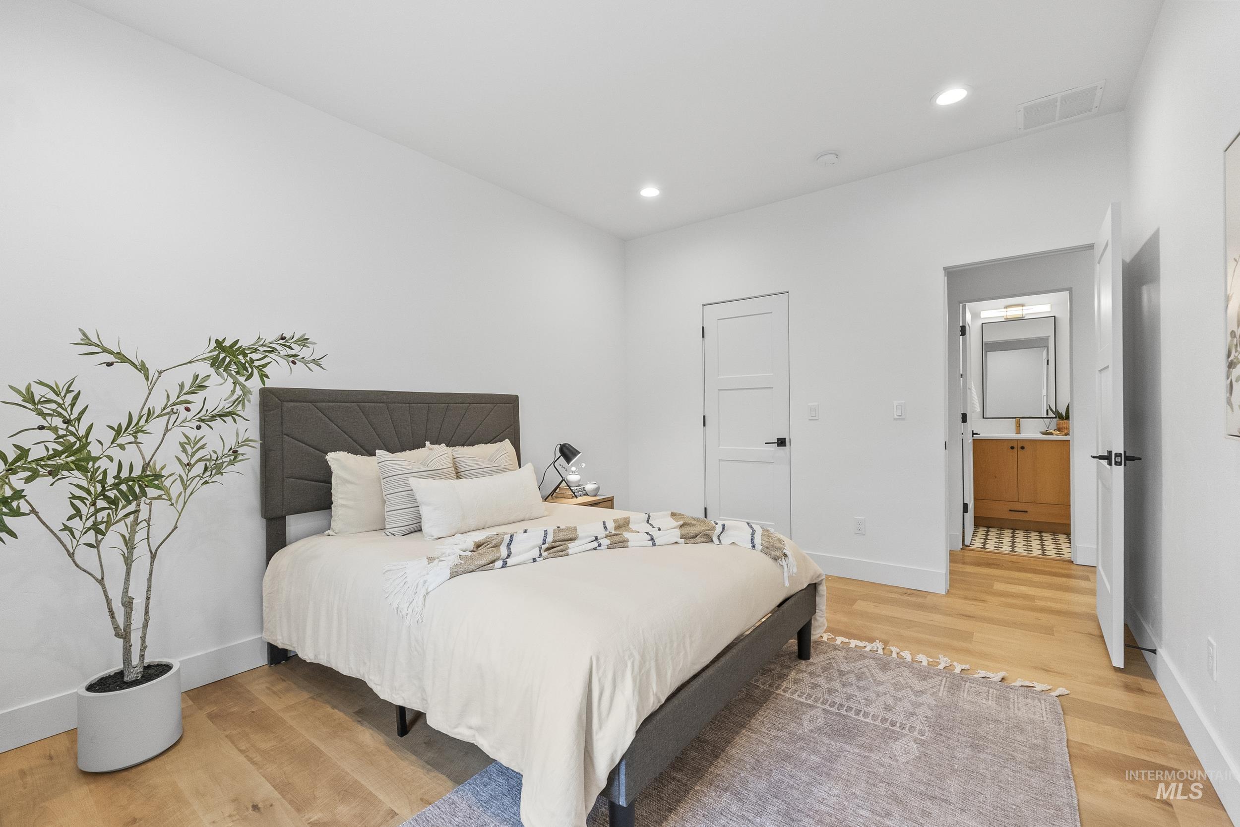 4320 South Selatir Way Meridian, ID 83642 - Photo 32 of 44 Bedroom featuring light wood-style floors and recessed lighting