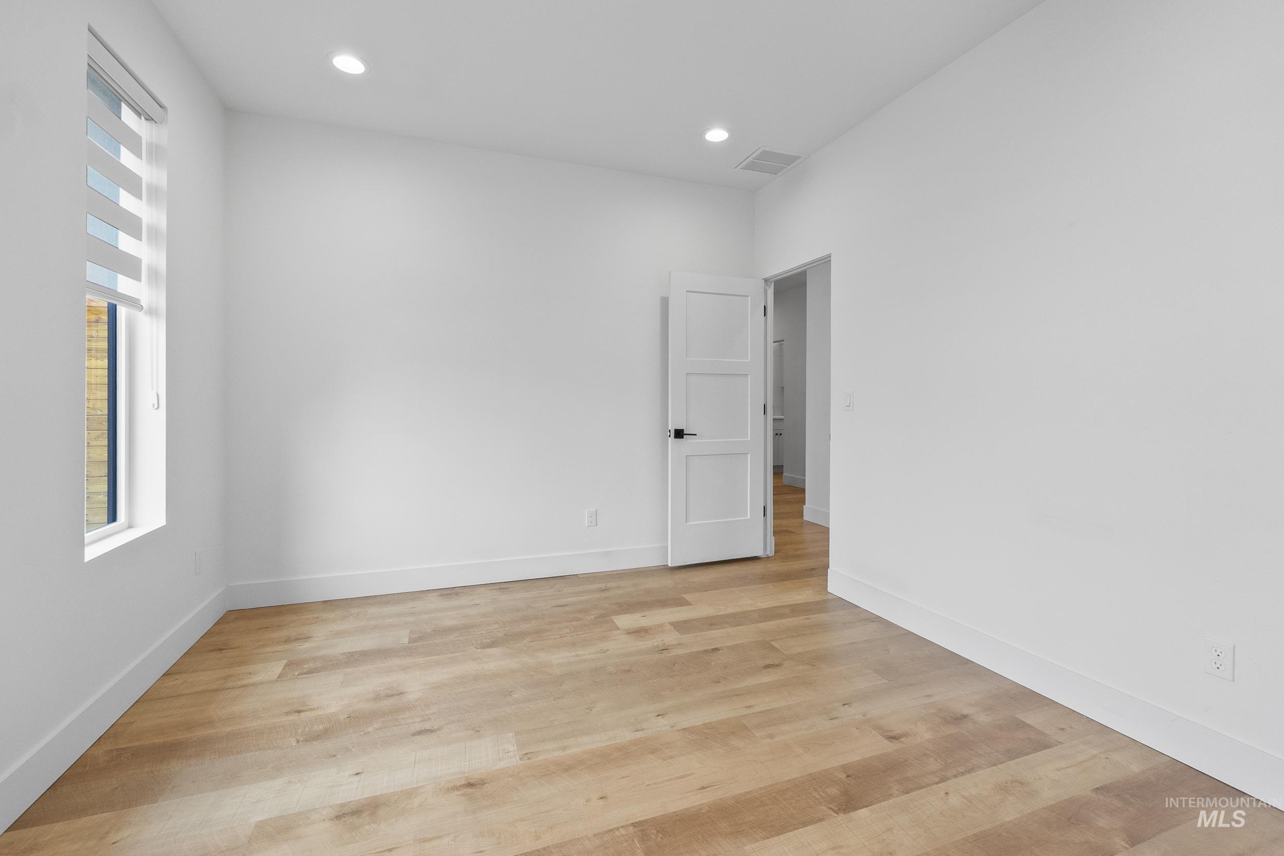 4320 South Selatir Way Meridian, ID 83642 - Photo 35 of 44 Spare room featuring recessed lighting and light wood-type flooring