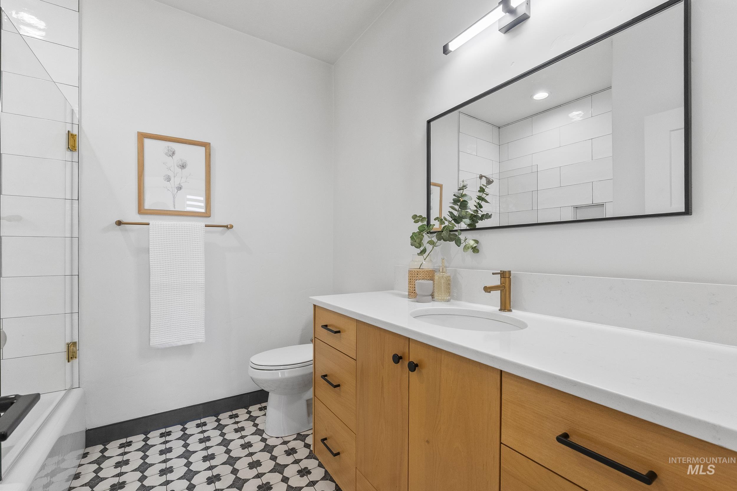 4320 South Selatir Way Meridian, ID 83642 - Photo 38 of 44 Bathroom featuring vanity, shower / tub combination, recessed lighting, and light tile patterned flooring