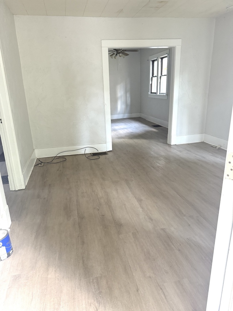 1850 East Prairie Avenue Decatur, IL 62521 - Photo 2 of 16 an empty room with windows