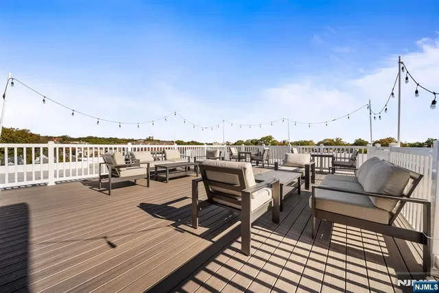 a view of a terrace with seating area