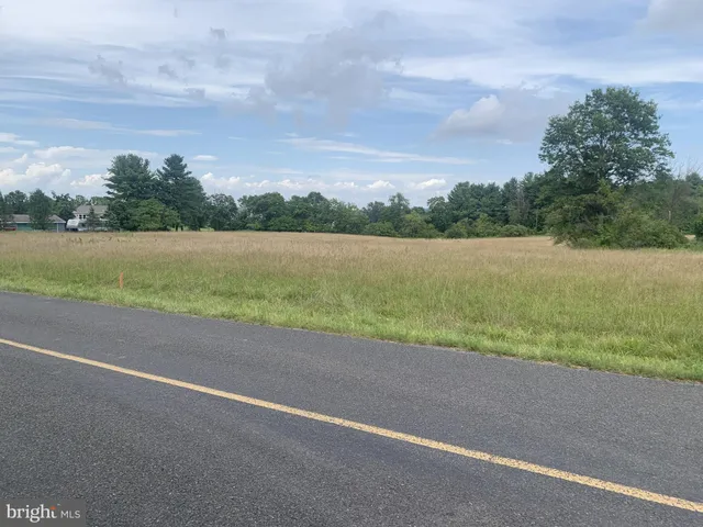 a view of a lake with a big yard