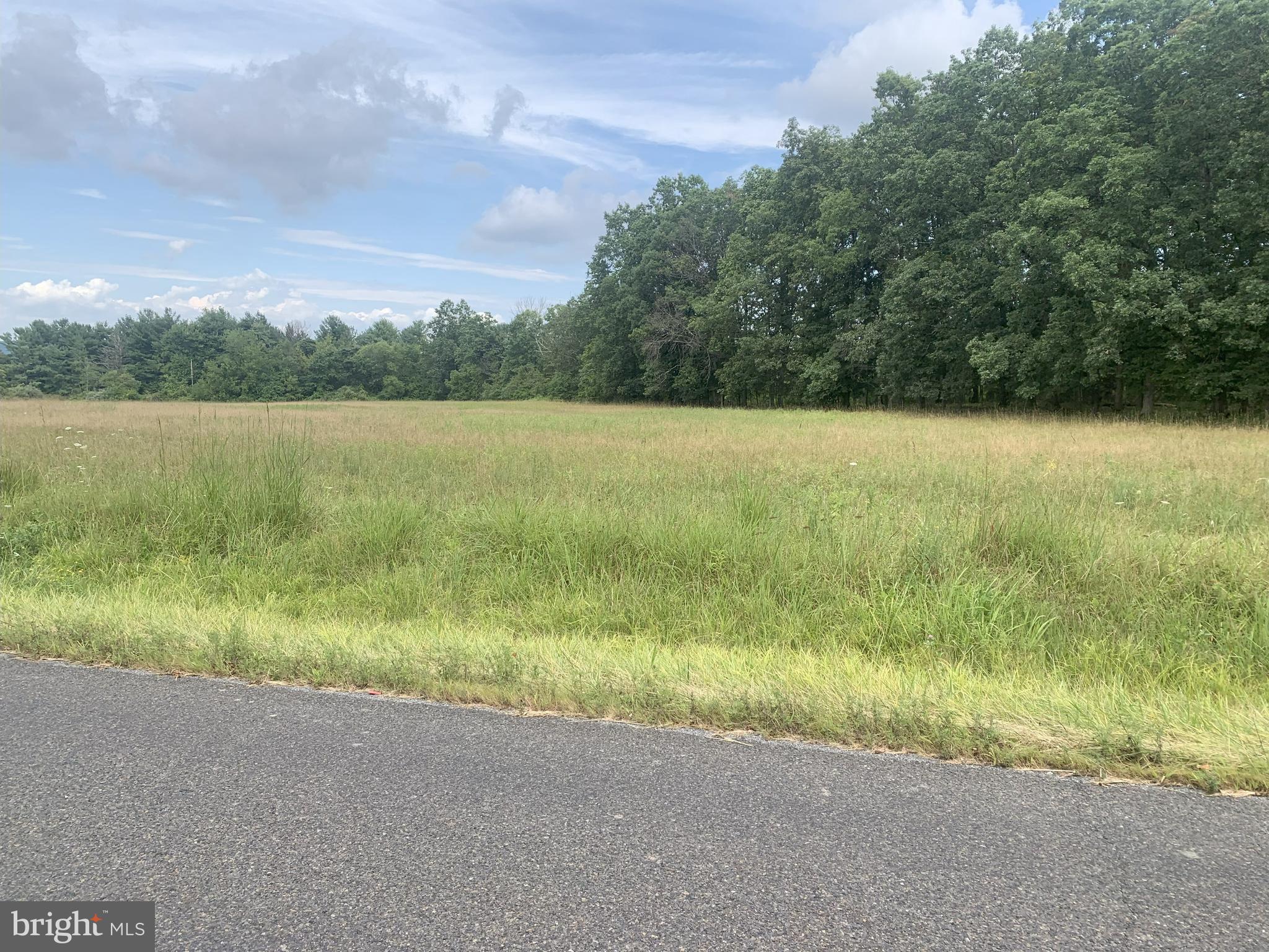 0 Winding Road Quakertown, PA 18951 - Photo 4 of 4 a view of a lake with a yard