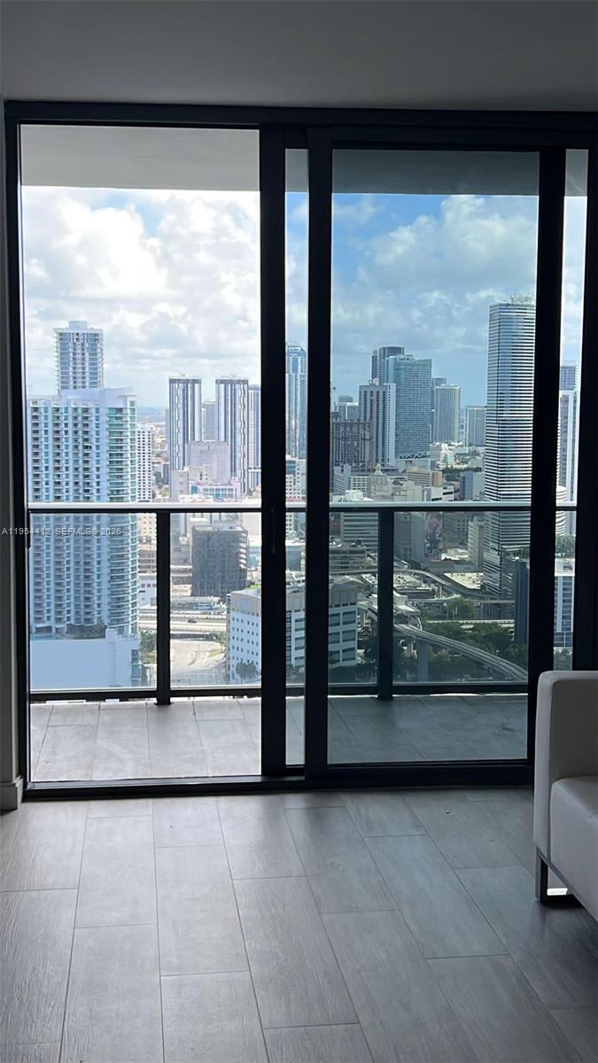 45 Southwest 9th Street, Unit 3910 Miami, FL 33130 - Photo 15 of 27 a view of a large window with a balcony