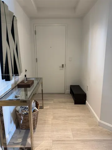 a view of storage and utility room with a sink