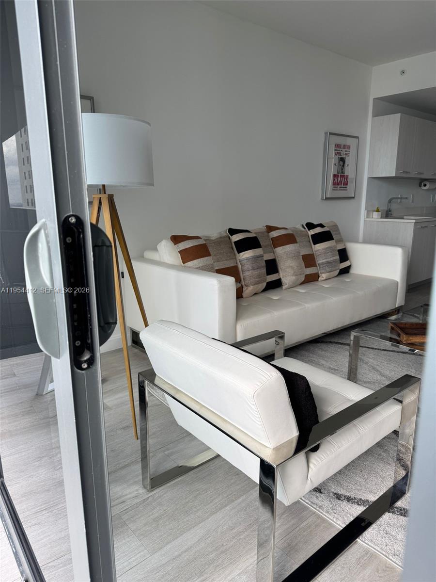 45 Southwest 9th Street, Unit 3910 Miami, FL 33130 - Photo 10 of 27 a room with furniture and a rug