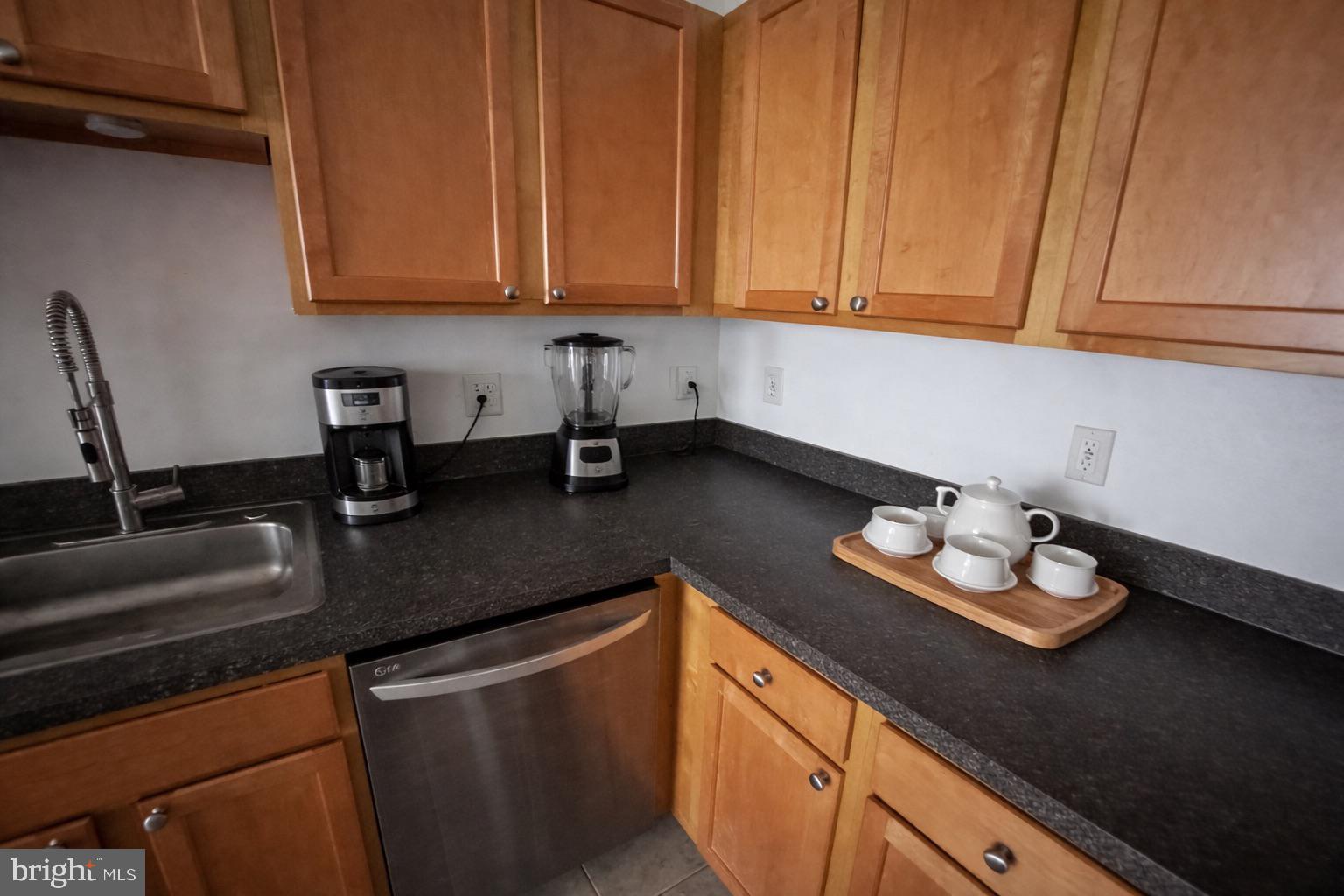 12000 Market Street, Unit 361 Reston, VA 20190 - Photo 16 of 50 Virtually Staged Kitchen