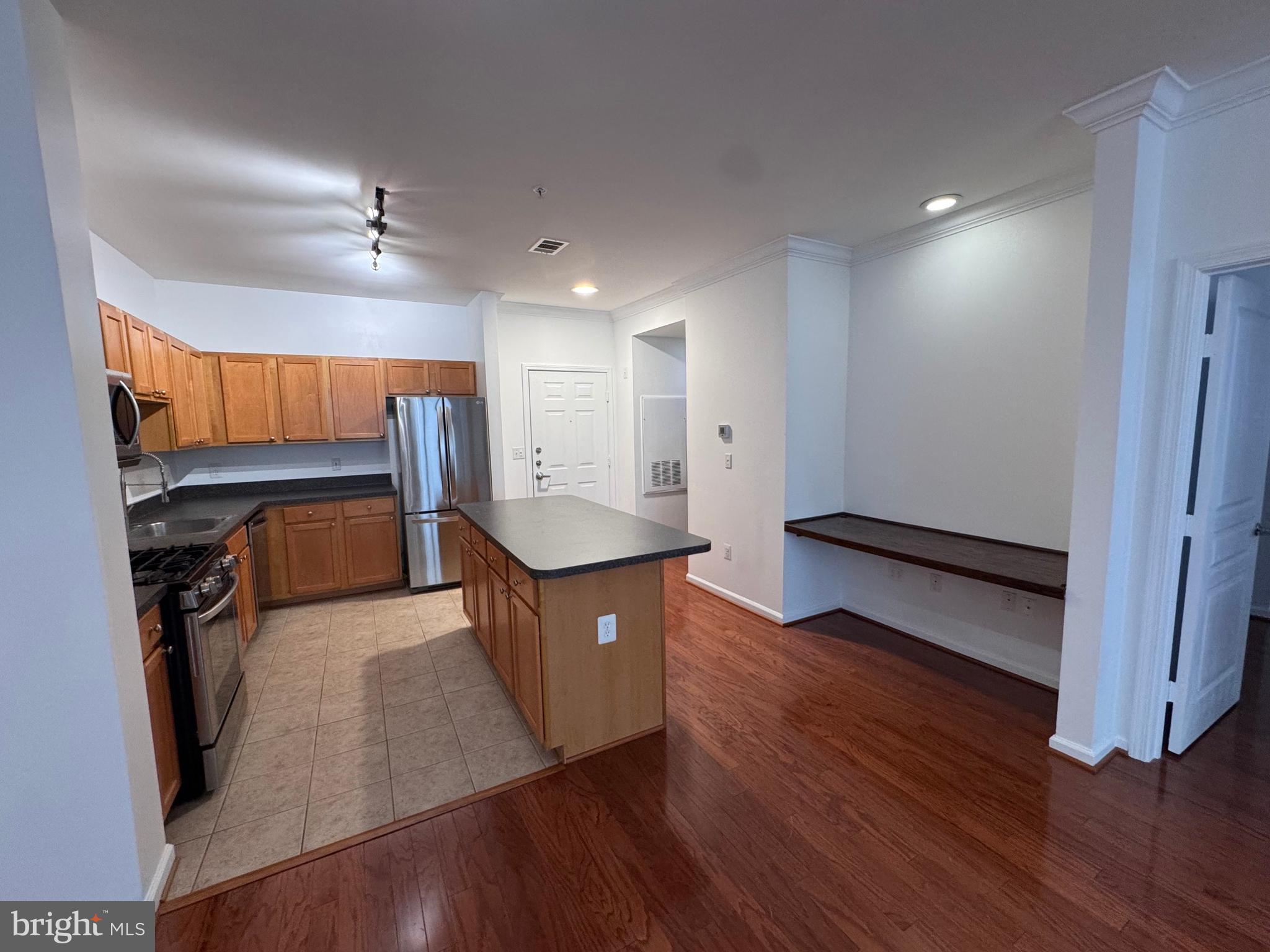 12000 Market Street, Unit 361 Reston, VA 20190 - Photo 23 of 49 a spacious bathroom with a sink and a mirror