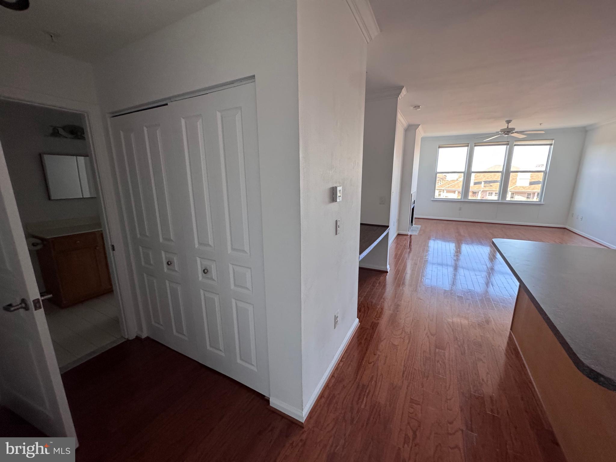 12000 Market Street, Unit 361 Reston, VA 20190 - Photo 24 of 49 a view of entryway with wooden floor