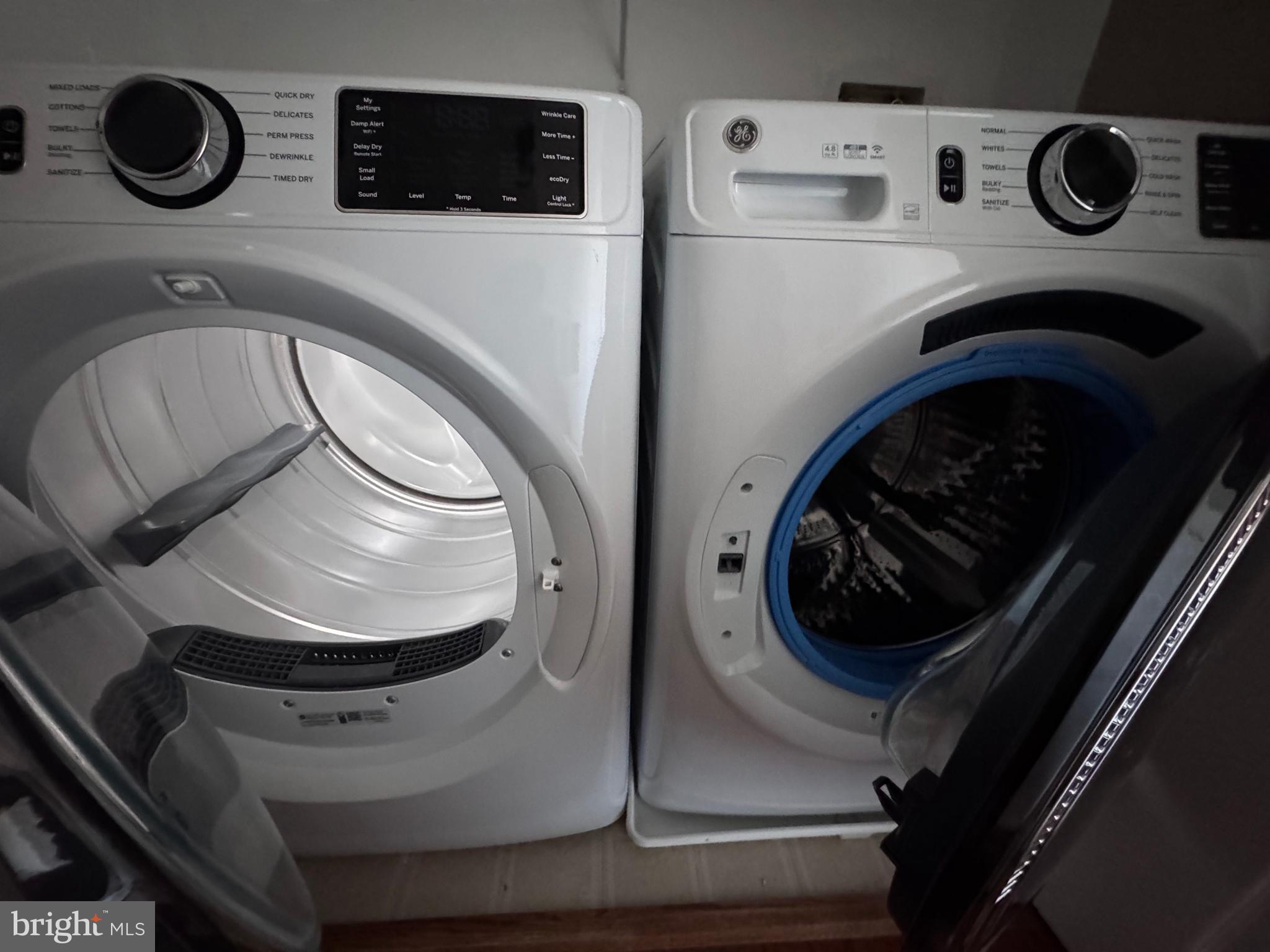 12000 Market Street, Unit 361 Reston, VA 20190 - Photo 31 of 49 a utility room with dryer and washer