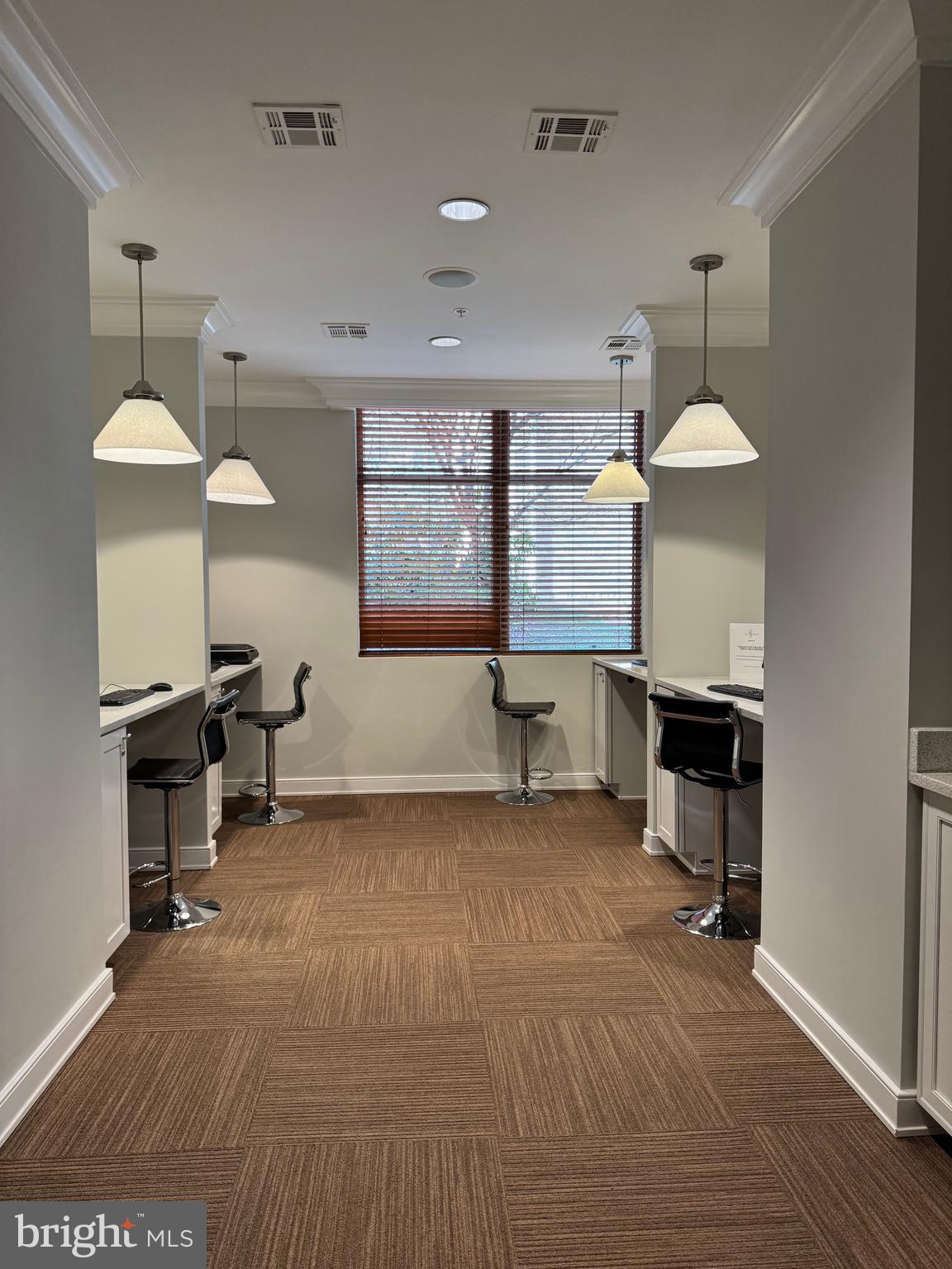 12000 Market Street, Unit 361 Reston, VA 20190 - Photo 40 of 49 a view of a room with furniture and a chandelier