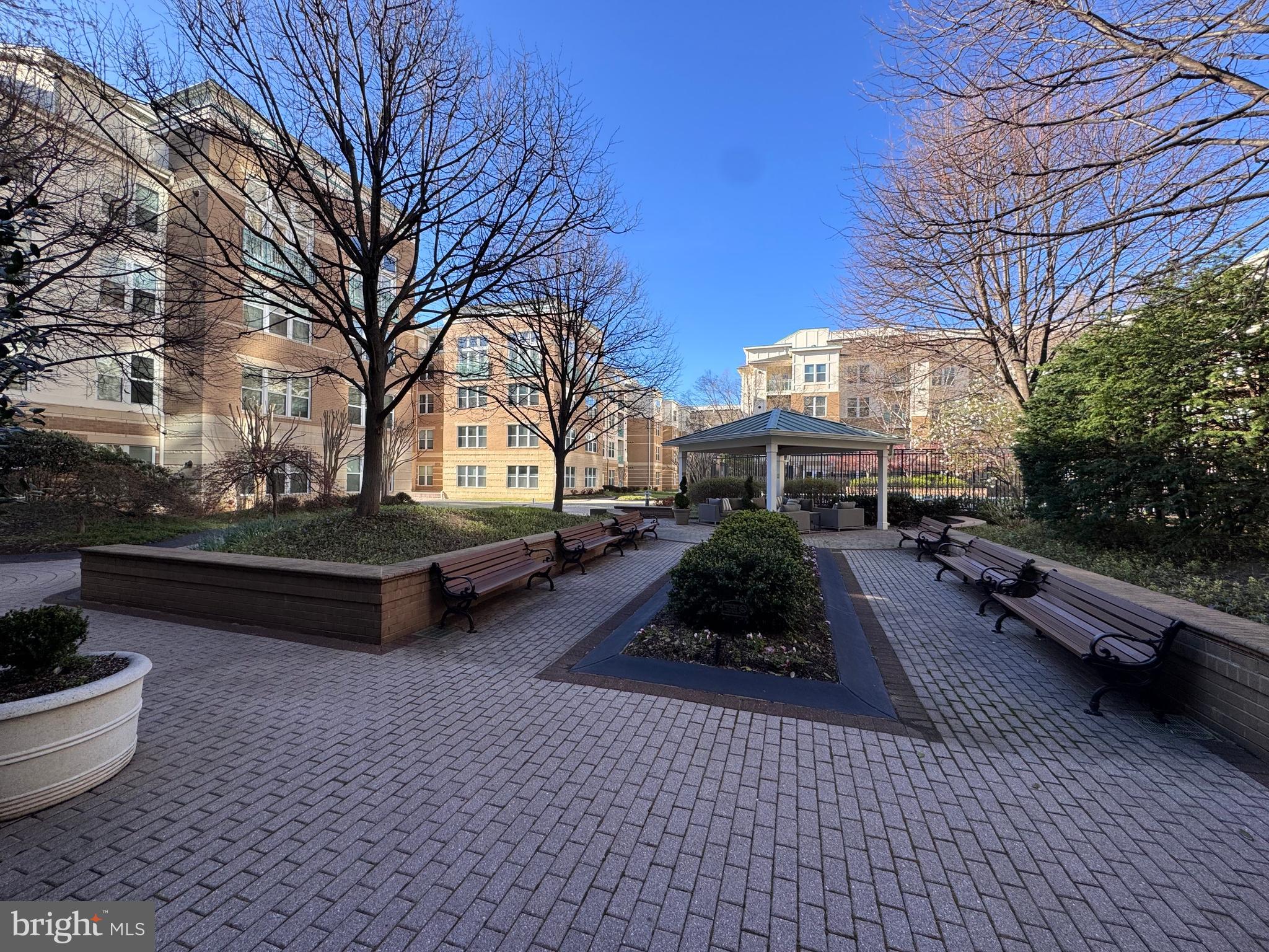 12000 Market Street, Unit 361 Reston, VA 20190 - Photo 44 of 49 a view of a street with cars parked
