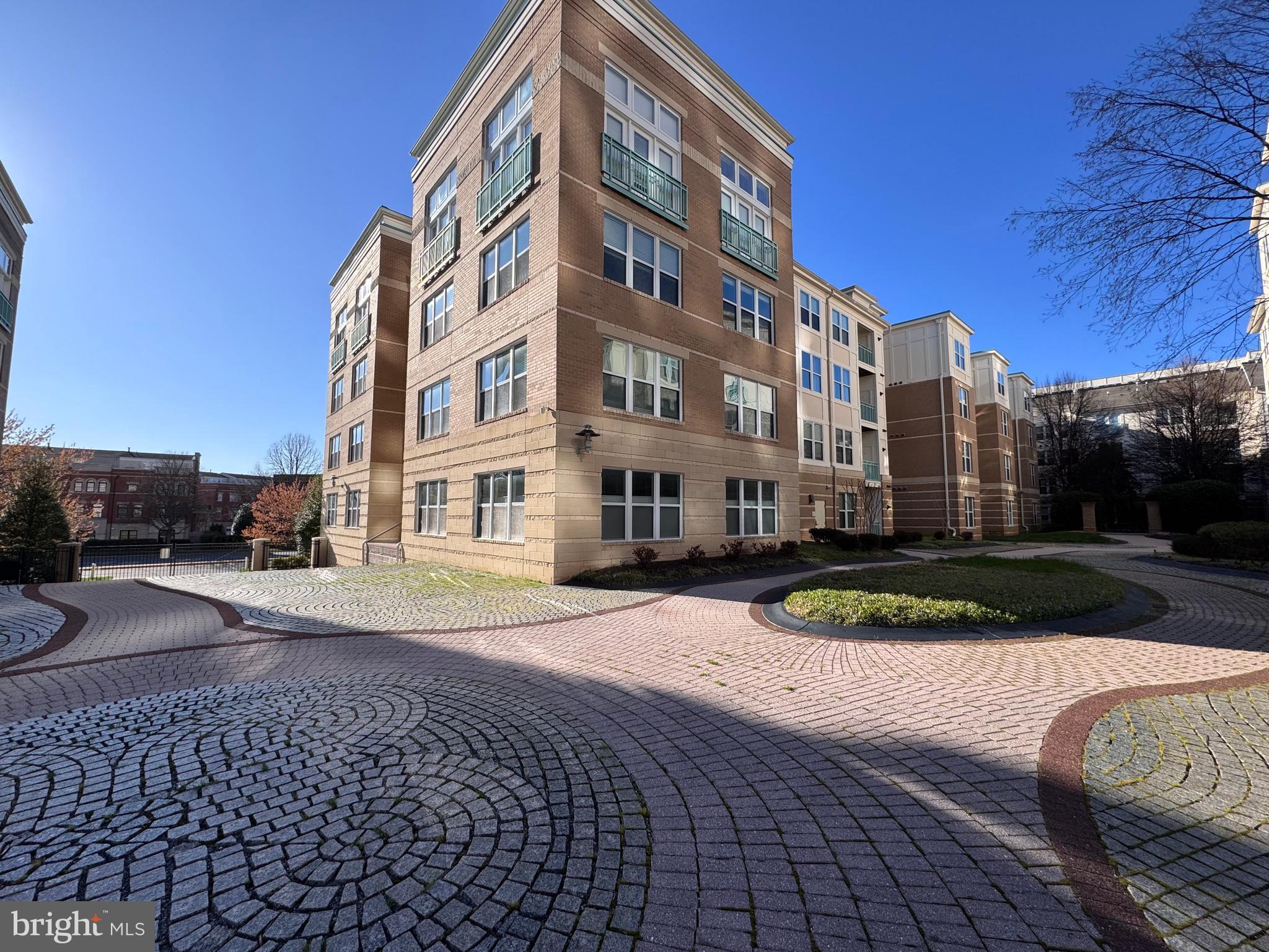 12000 Market Street, Unit 361 Reston, VA 20190 - Photo 49 of 49 a view of a building with a yard