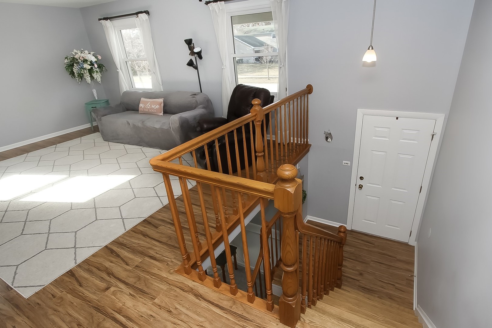 993 Bernard Drive Buffalo Grove, IL 60089 - Photo 15 of 29 a view of entryway and hall with wooden floor