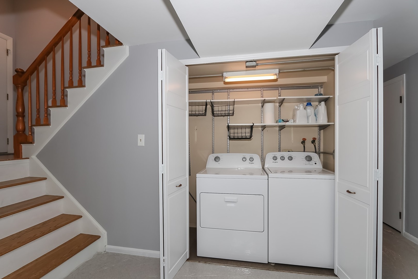 993 Bernard Drive Buffalo Grove, IL 60089 - Photo 24 of 29 a view of storage and utility room with washer and dryer