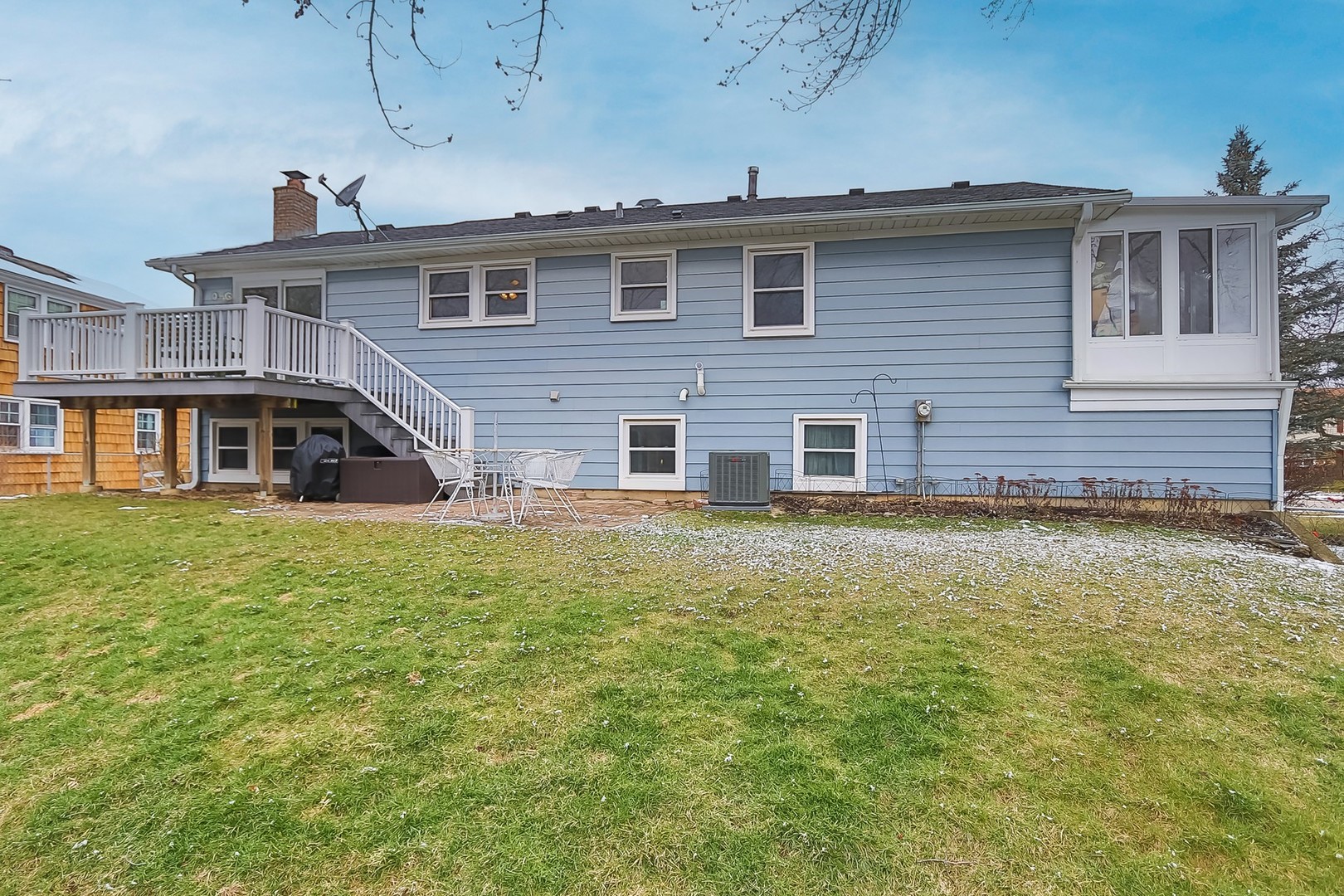 993 Bernard Drive Buffalo Grove, IL 60089 - Photo 29 of 29 a front view of a house with a yard