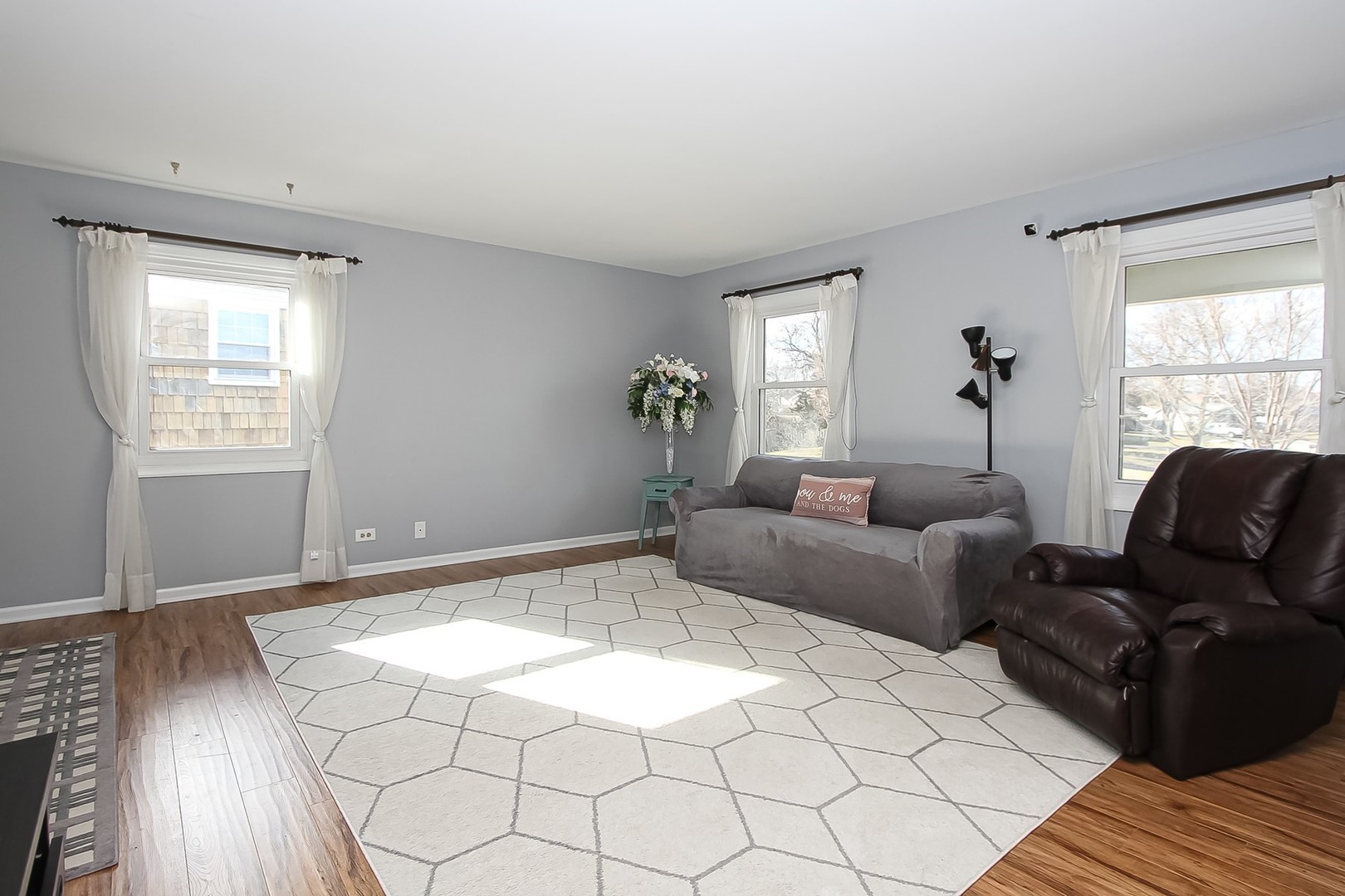 993 Bernard Drive Buffalo Grove, IL 60089 - Photo 3 of 29 a living room with furniture and wooden floor