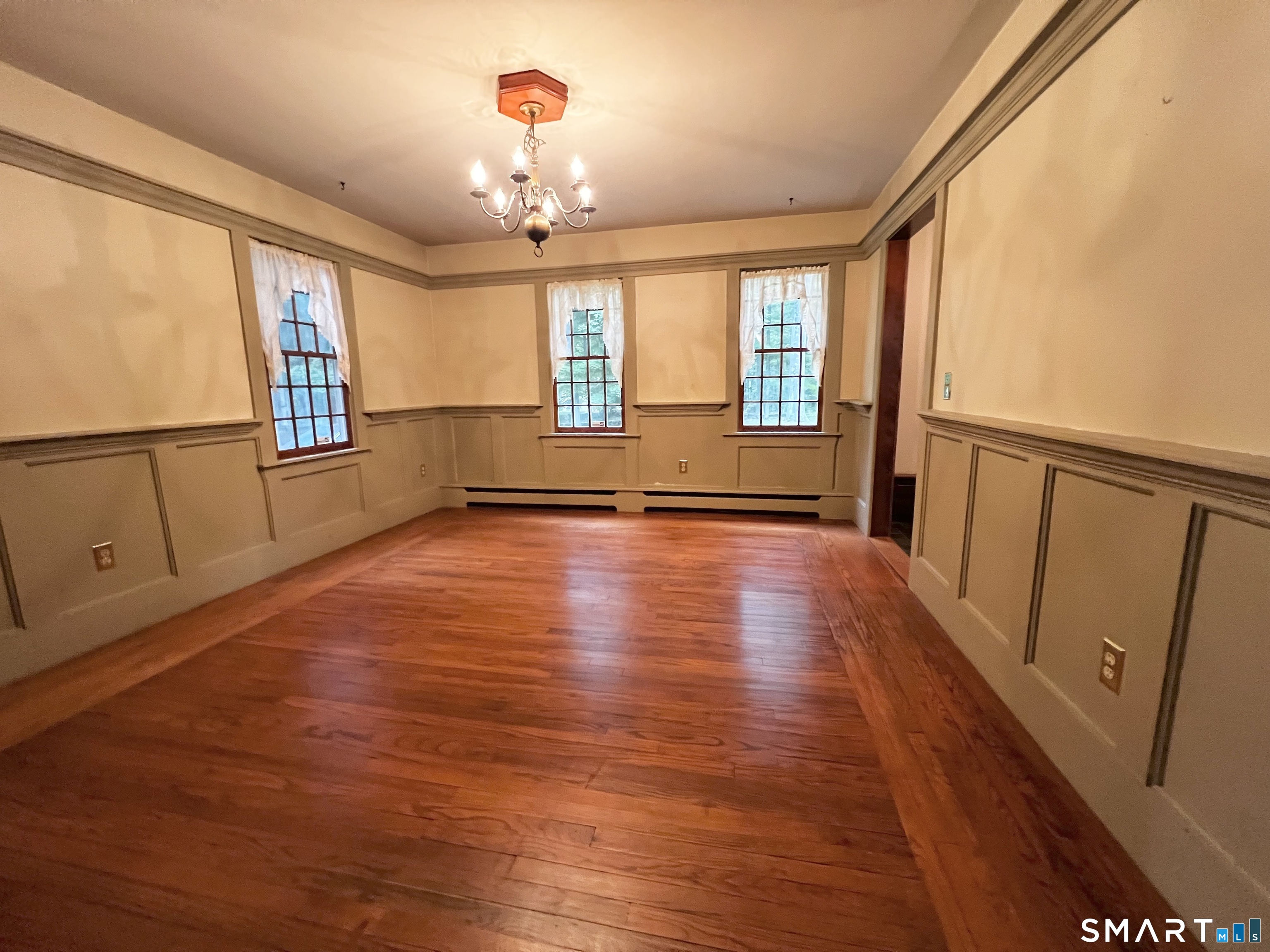 38 Clark Hill Road East Haddam, CT 06423 - Photo 16 of 35 a view of an empty room with wooden floor and a window