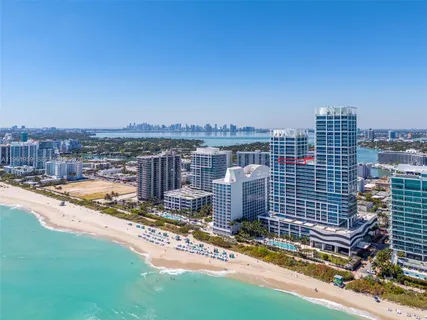 a picture of a bathroom with a bathtub and shower