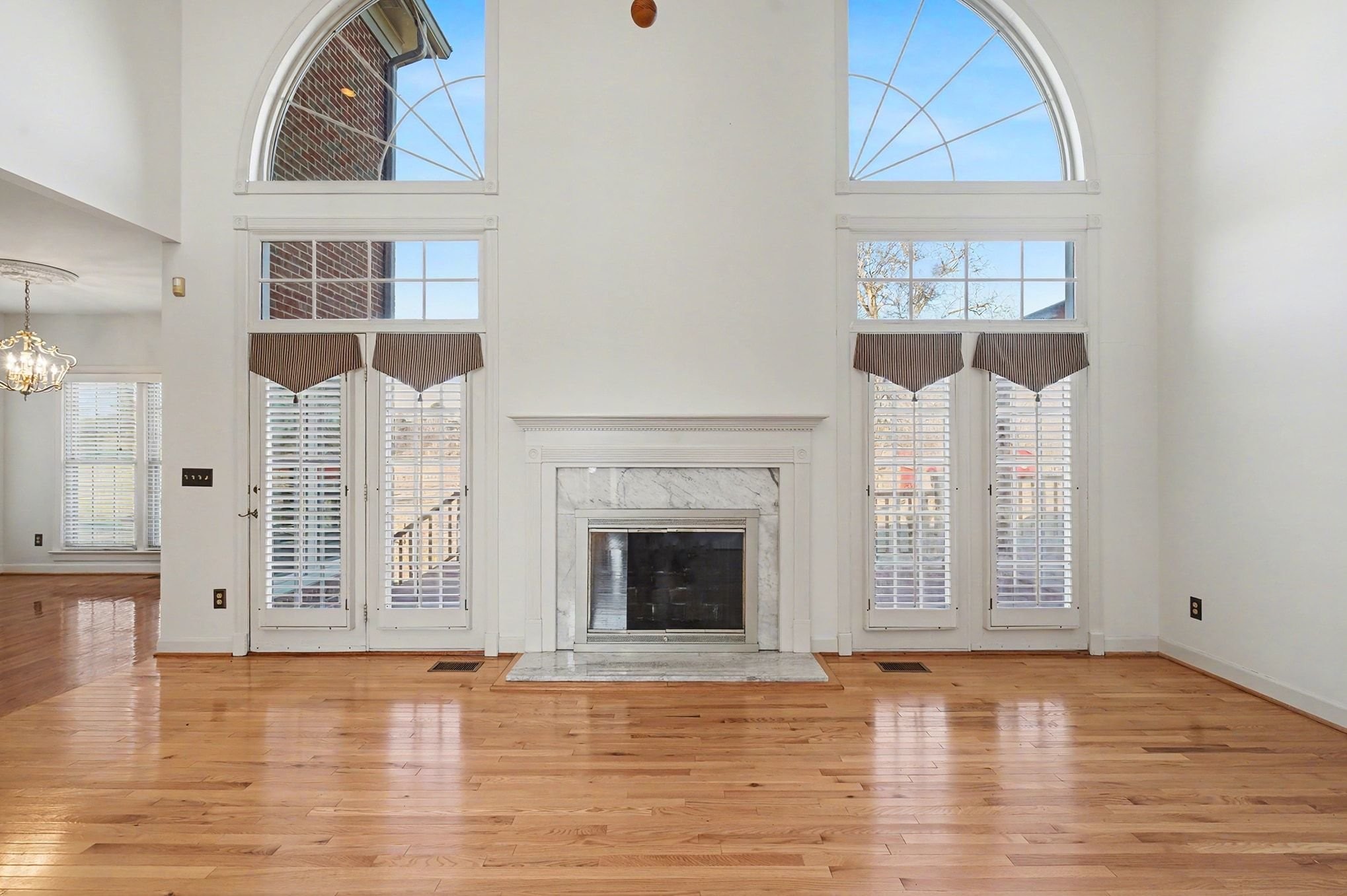 2132 Neelys Bend Road Madison, TN 37115 - Photo 11 of 74 a view of a livingroom with wooden floor and a fireplace