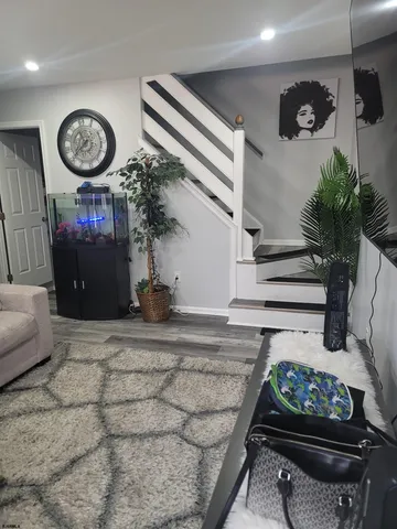 a view of a entryway door with furniture