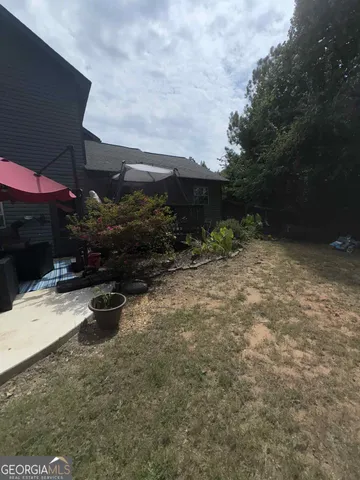 a view of outdoor space and yard