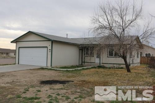 1269 Lattin Road Fallon, NV 89406 - Photo 1 of 1 a view of a house with a yard