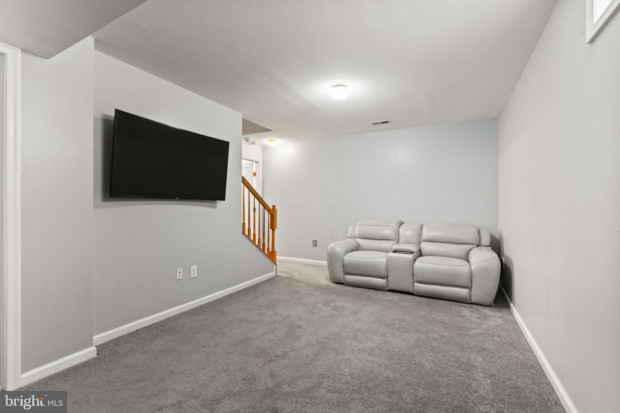 6149 Downs Ridge Court Elkridge, MD 21075 - Photo 25 of 47 Basement rec room