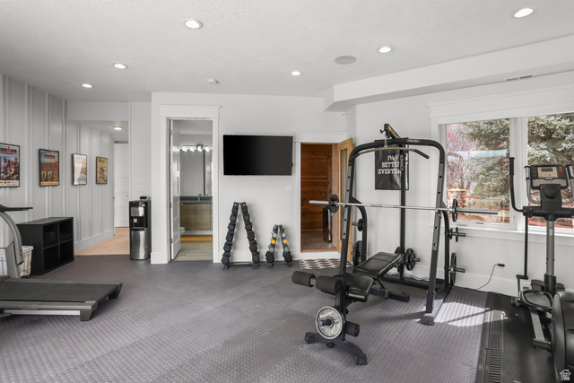 1354 South 800 East Mapleton, UT 84664 - Photo 82 of 129 Exercise room featuring recessed lighting and a decorative wall