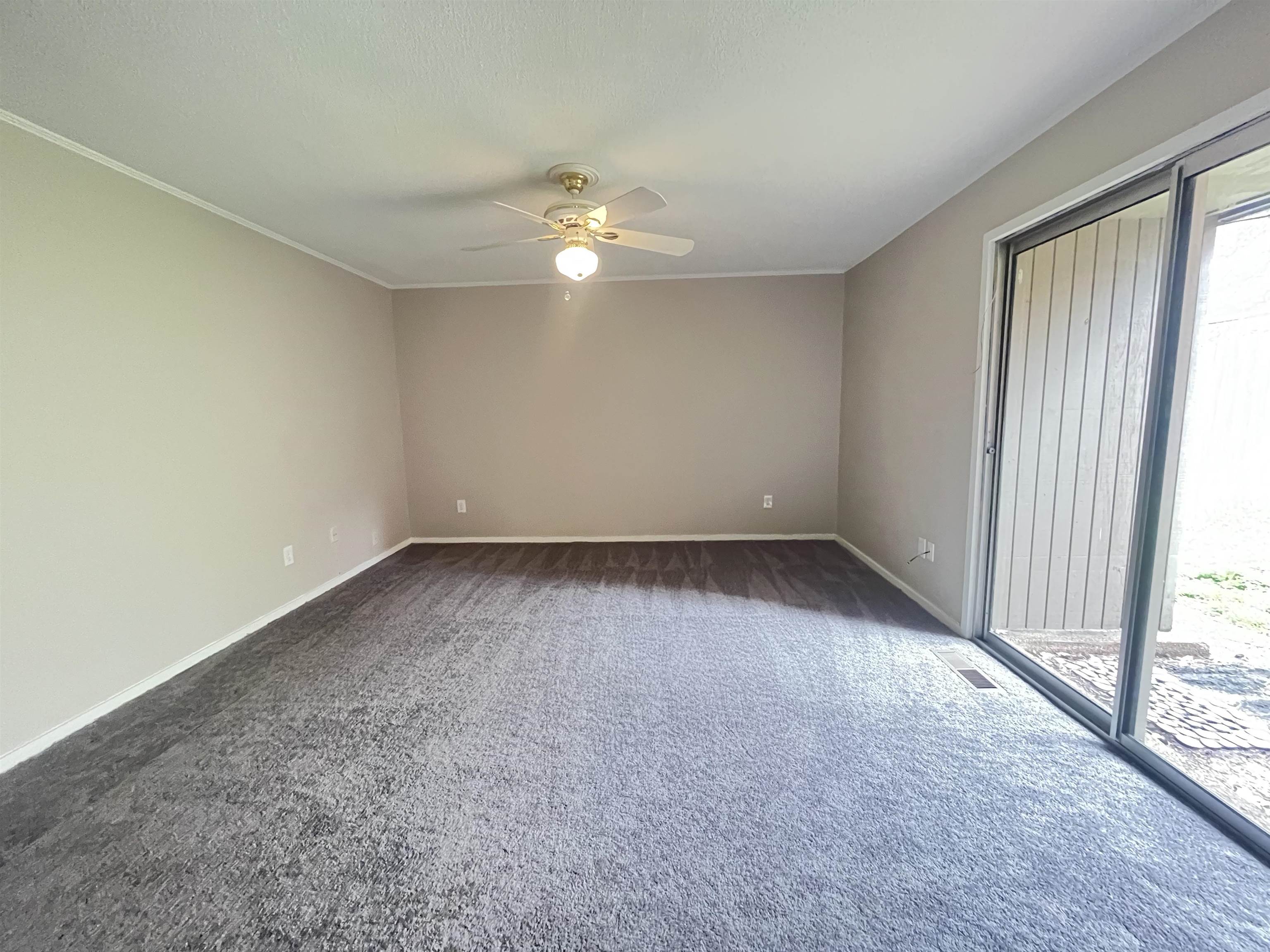 5763 Barfield Road, Unit 5763 Memphis, TN 38120 - Photo 13 of 21 an empty room with a empty space and a window