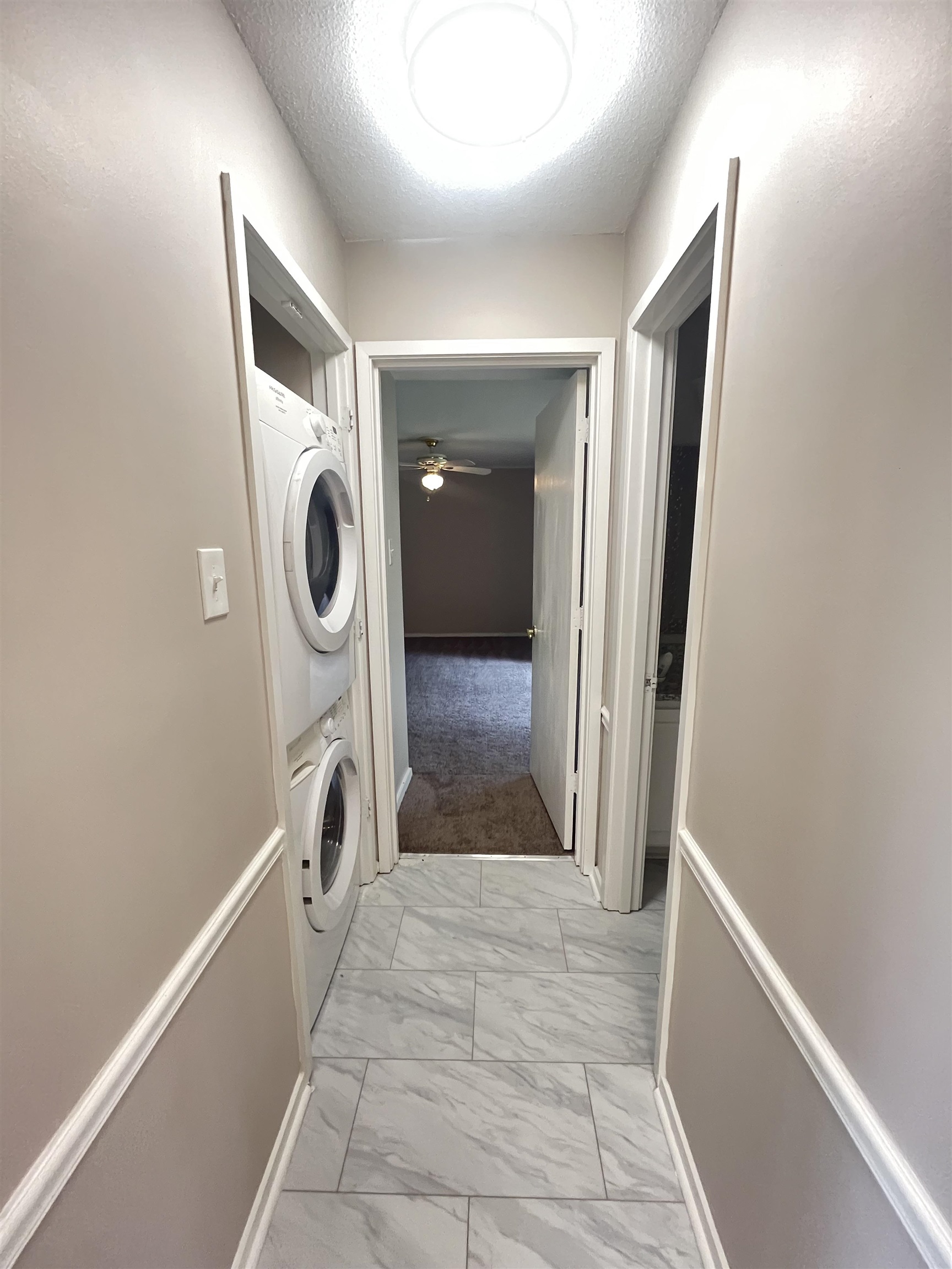5763 Barfield Road, Unit 5763 Memphis, TN 38120 - Photo 15 of 21 a view of a hallway with washer and dryer